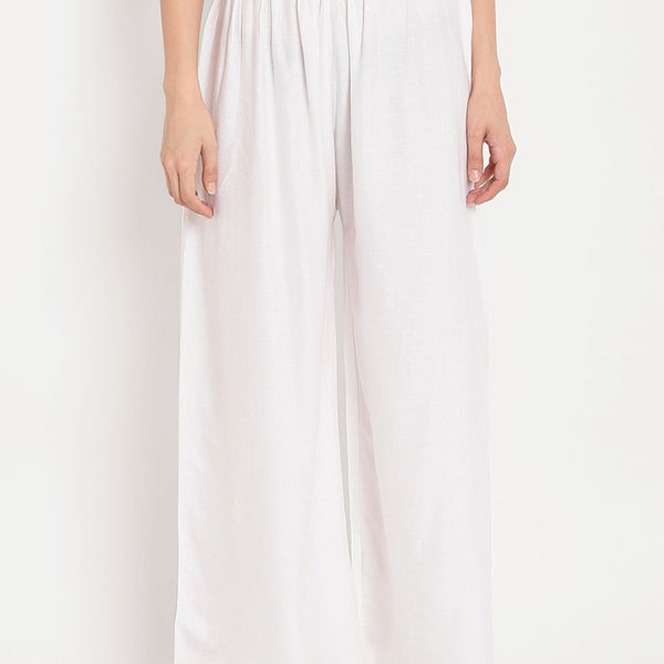 TAG 7 Women White Solid Flared Palazzos - Distacart