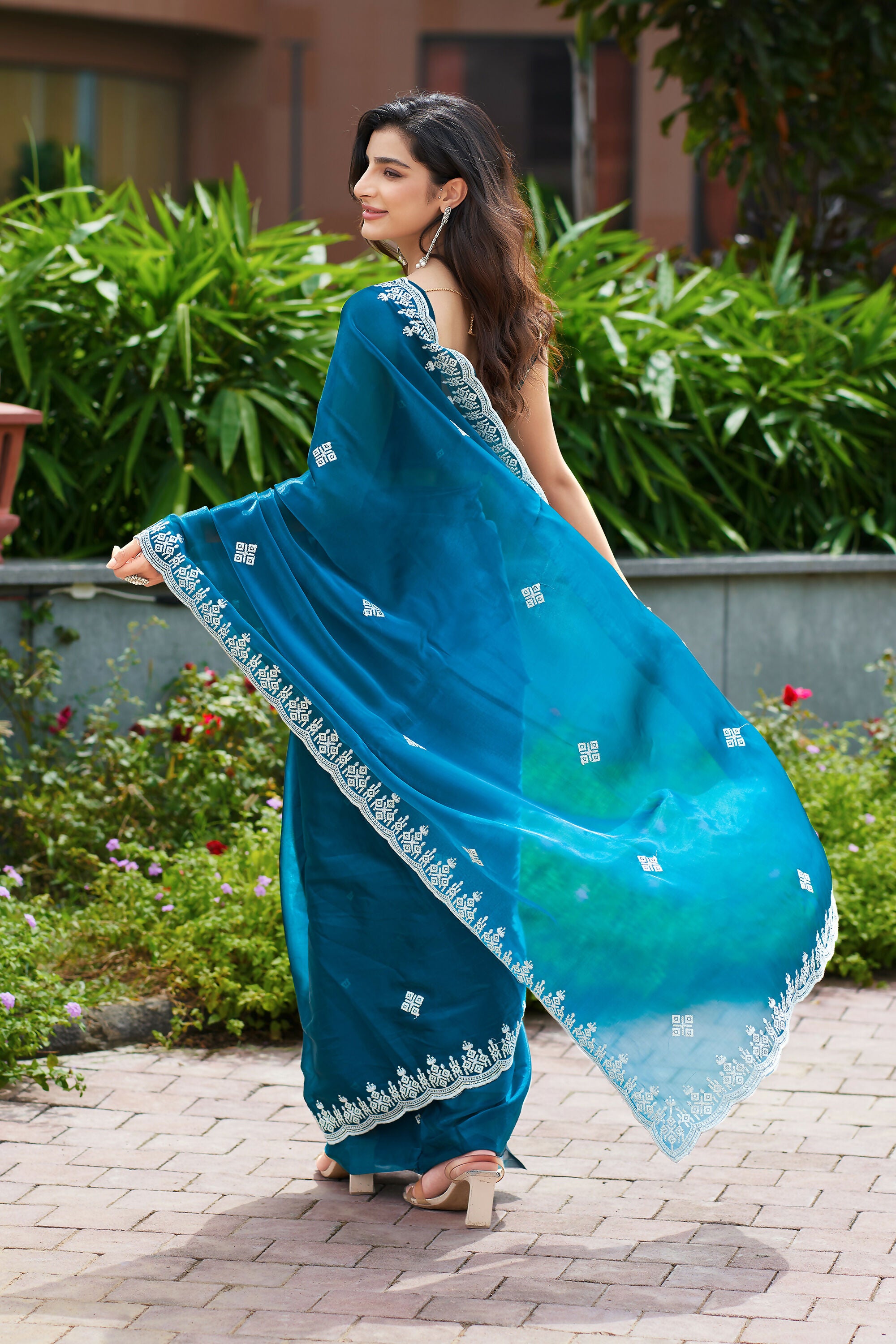 Vastranavya Teal Embroidery Work Shimmer Chiffon Saree with Unstitched Blouse