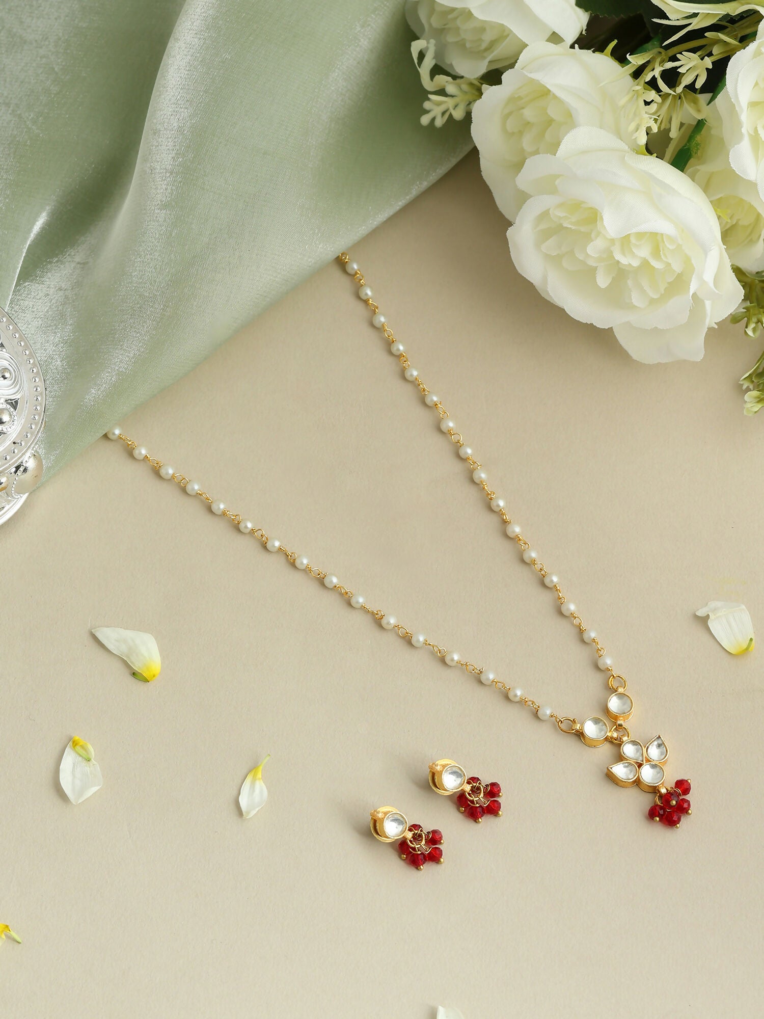 Ruby Raang Kundan Studded And Pearl Beaded Jewellery Set