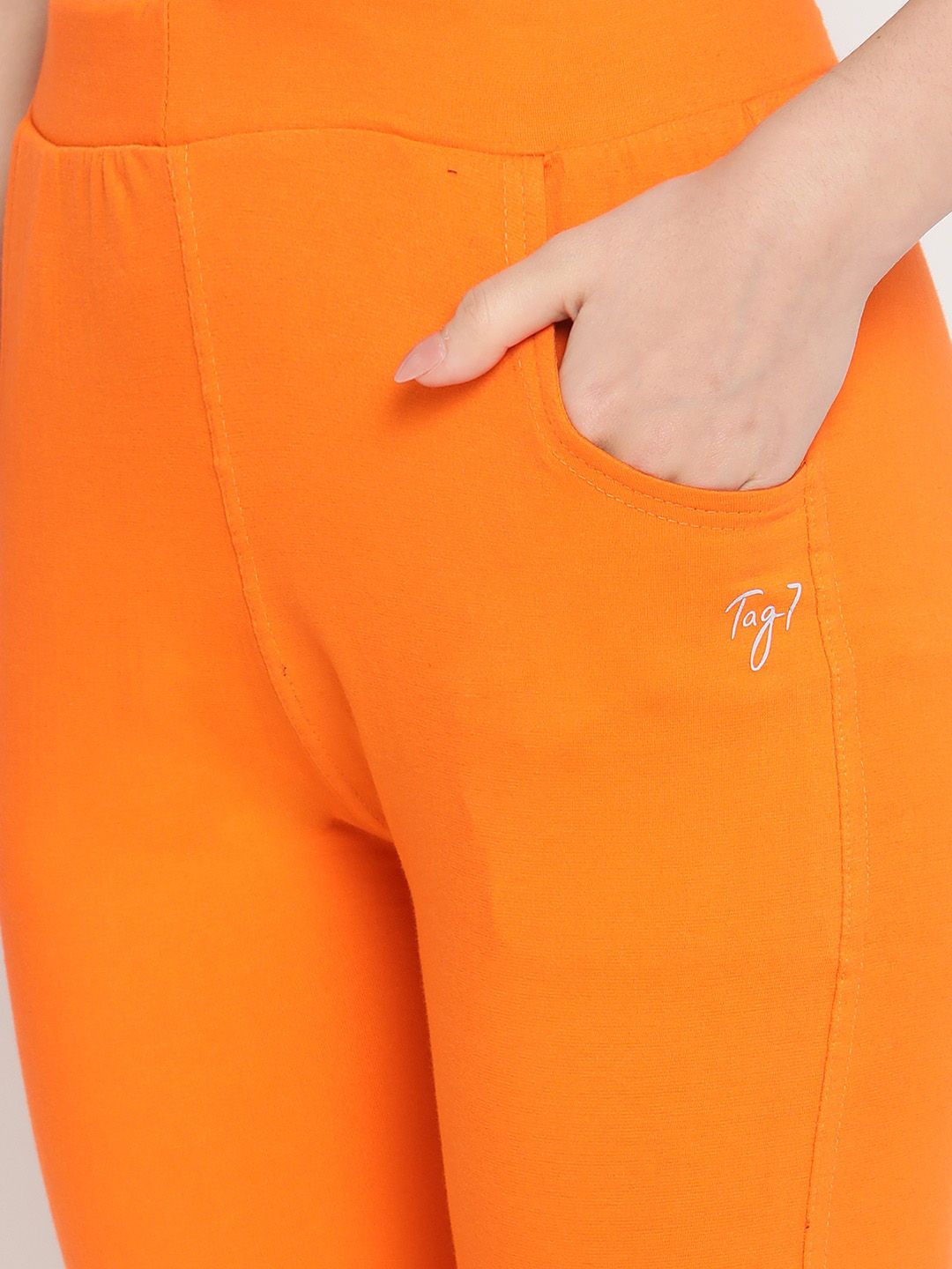 TAG 7 Women Orange Solid Leggings - Distacart
