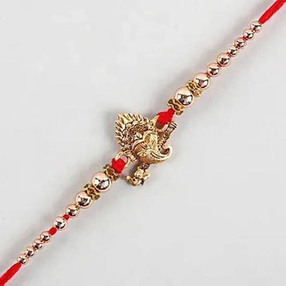 Auspicious Ganesha Rakhi And Almonds Jar - Distacart