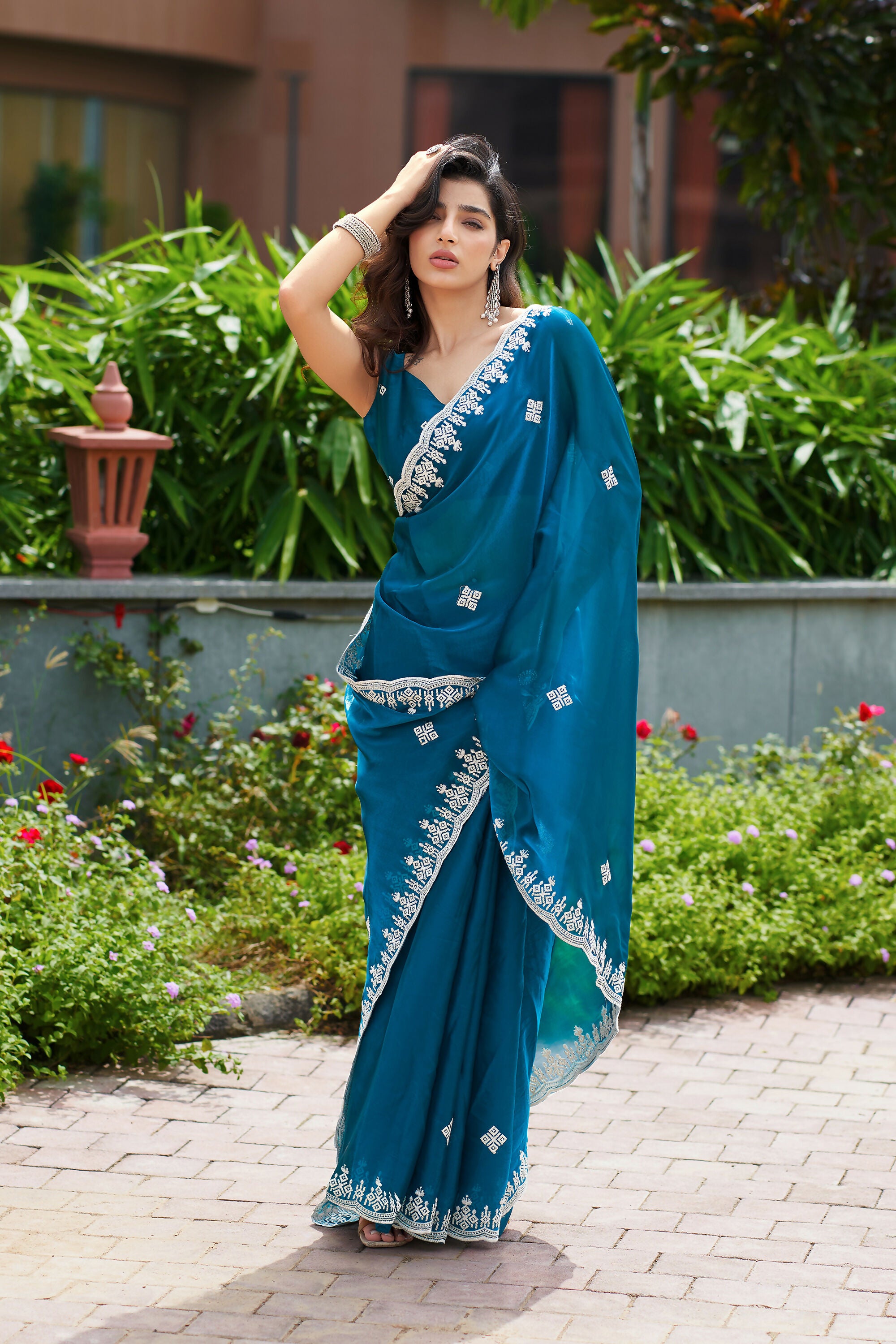 Vastranavya Teal Embroidery Work Shimmer Chiffon Saree with Unstitched Blouse
