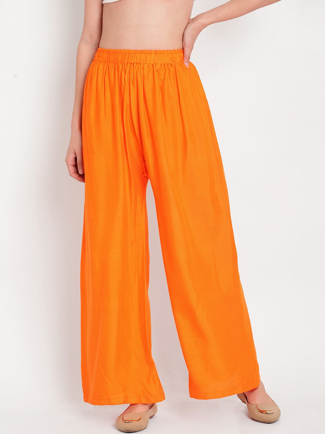 TAG 7 Women Orange Solid Flared Palazzos - Distacart