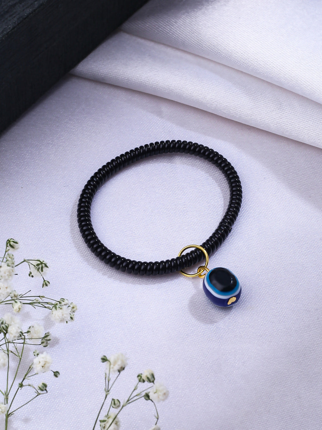 NVR Women & Men Black Evil Eye Spring Ring Rakhi With Roli Chawal - Distacart