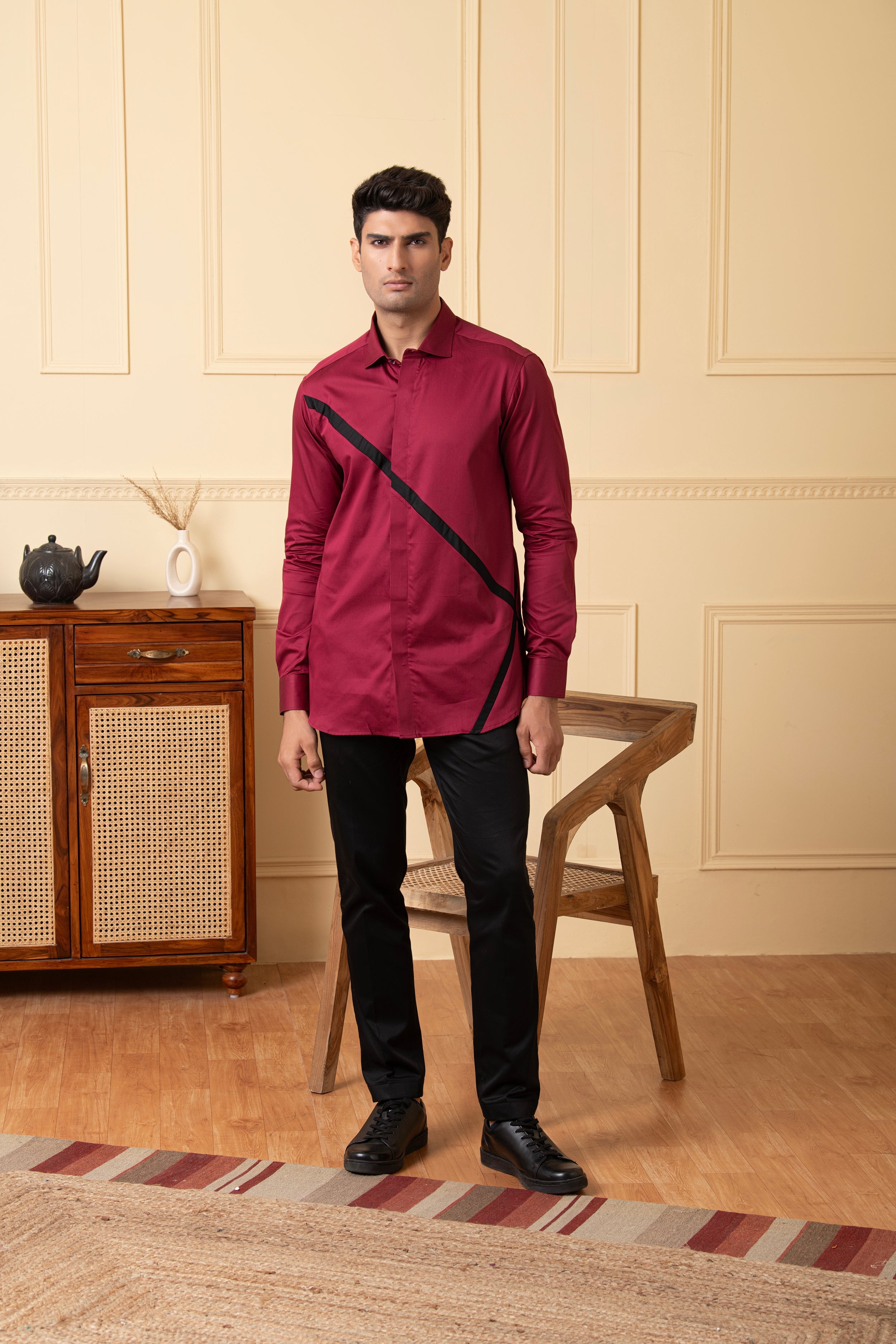 Red Shirt With V-Shaped Black Strip by Hilo Design