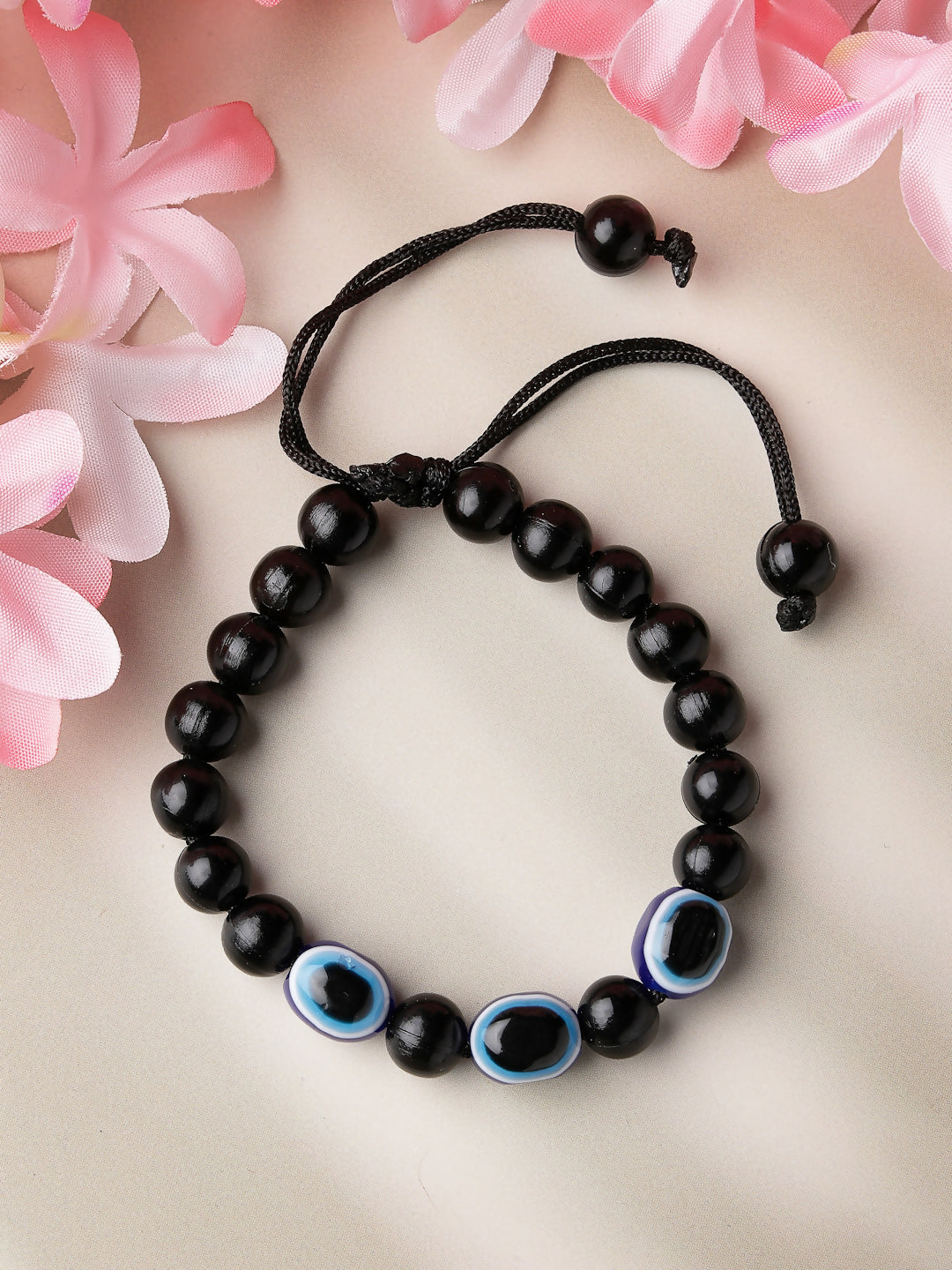 NVR Women & Men Black Evil Eye Rakhi With Roli Chawal - Distacart