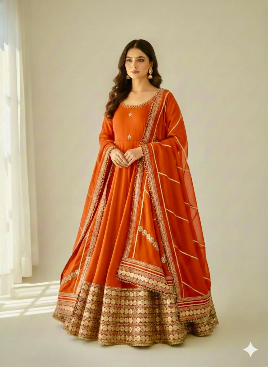 Teeya Creation Womens New Fancy Silk Heavy Quality Fabric With Handwork Orange Gown Set - Dista