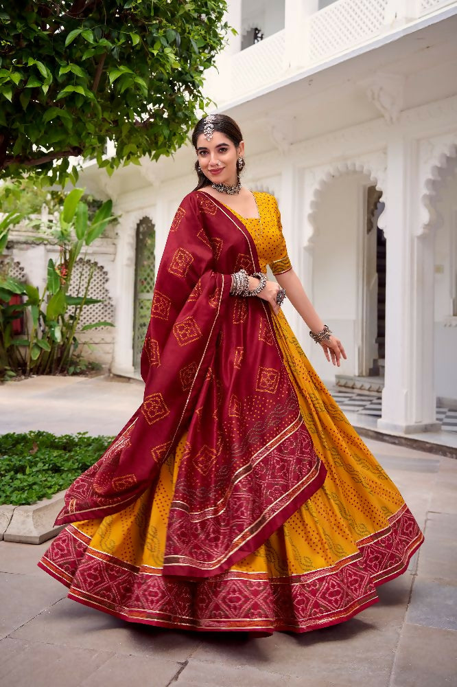 Evanik Yellow Tassa Silk With Bandhej Print Lehenga Choli - Distacart
