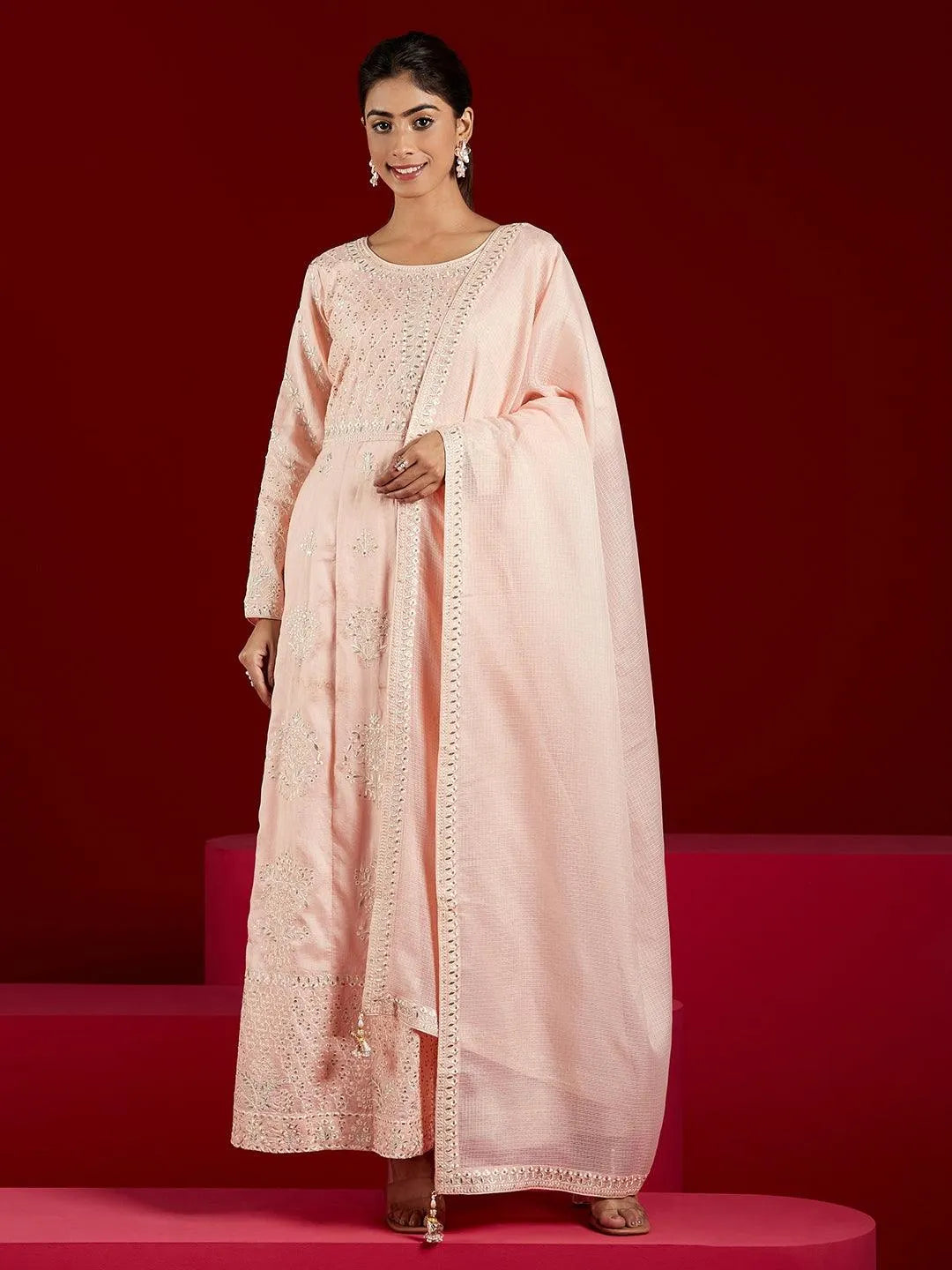 https://cdn.shopify.com/s/files/1/0341/4805/7228/products/libas-art-peach-embroidered-silk-a-line-kurta-with-trousers-and-dupatta-libas-2.jpg?v=1738934688