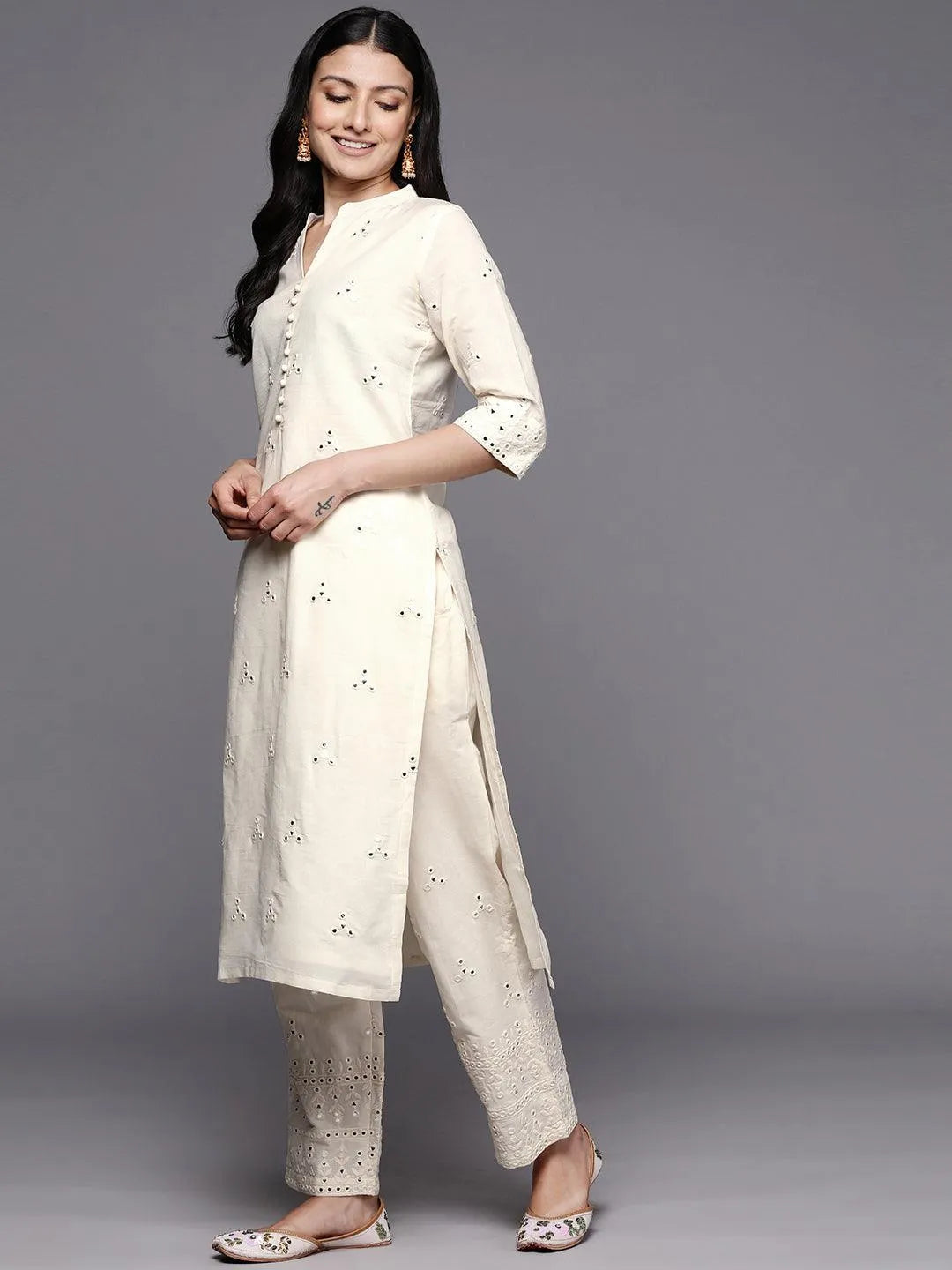 https://cdn.shopify.com/s/files/1/0341/4805/7228/files/off-white-embroidered-cotton-straight-kurta-with-dupatta-libas-3-27531360731286.jpg?v=1739182368