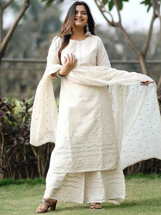 https://cdn.shopify.com/s/files/1/0341/4805/7228/files/off-white-embroidered-cotton-straight-kurta-with-palazzos-and-dupatta-libas-1.jpg?v=1739541888