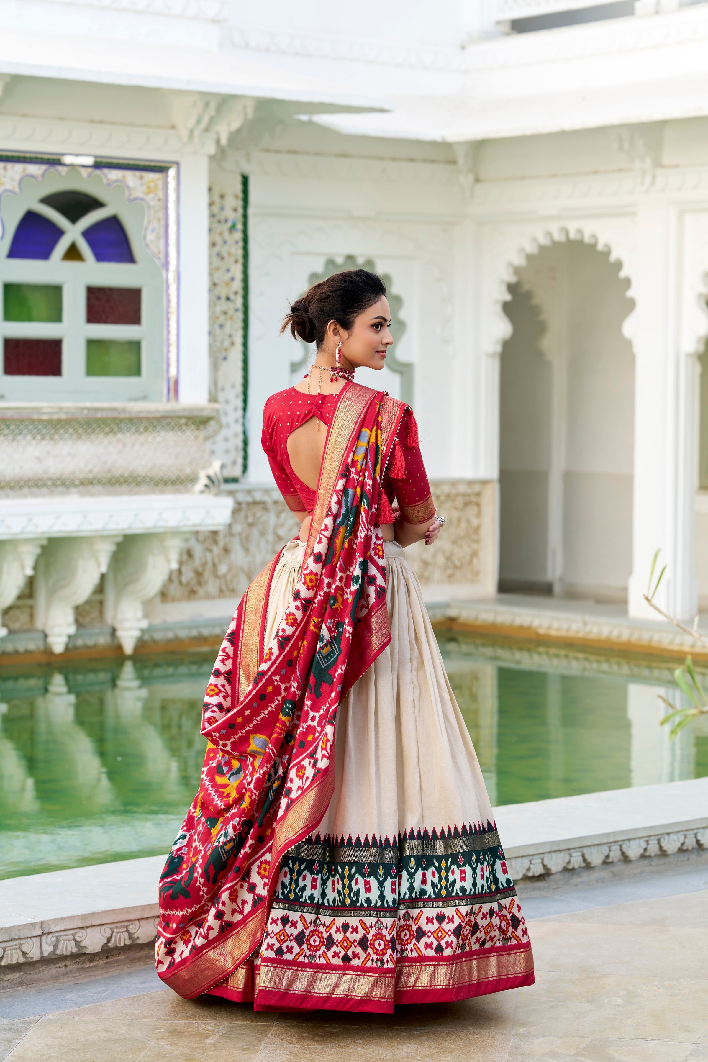 Evanik Off White Traditional Style Tussar Silk Patola Print With Foil Work Unstitched Lehenga Choli