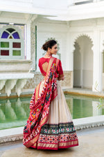 Thumbnail for Evanik Off White Traditional Style Tussar Silk Patola Print With Foil Work Unstitched Lehenga Choli