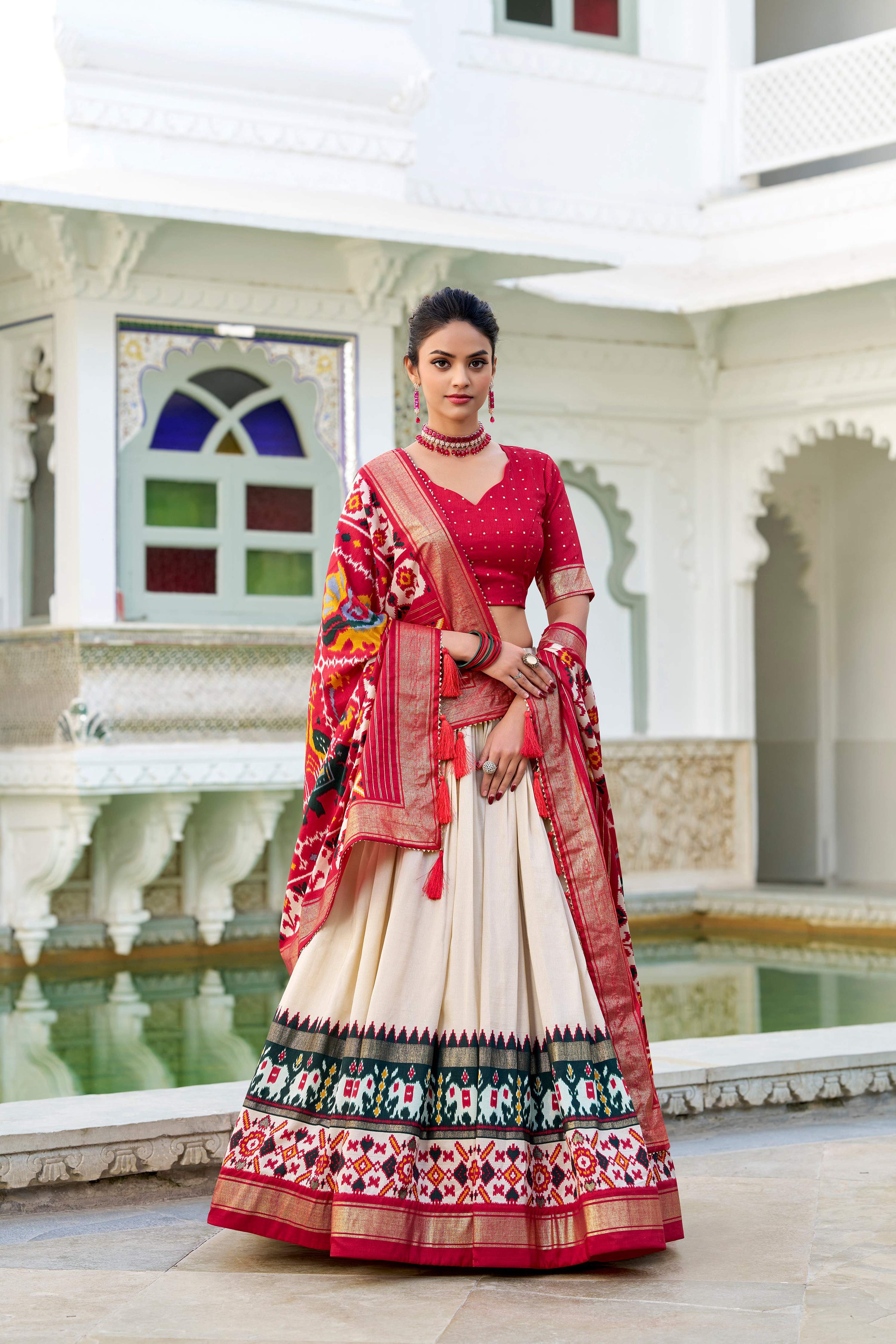 Evanik Off White Traditional Style Tussar Silk Patola Print With Foil Work Unstitched Lehenga Choli