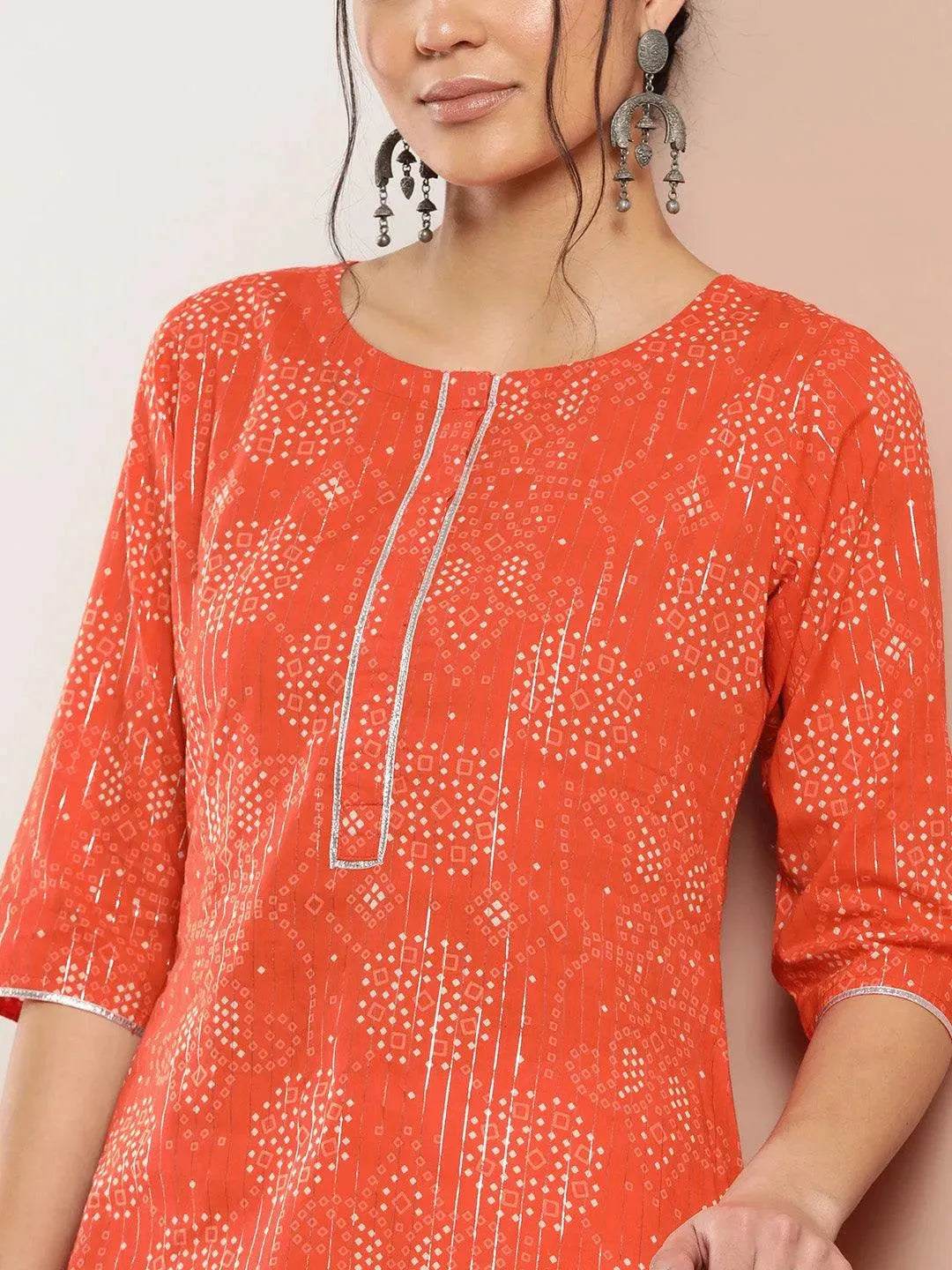https://cdn.shopify.com/s/files/1/0341/4805/7228/files/orange-printed-cotton-straight-kurta-libas-5.jpg?v=1738926981