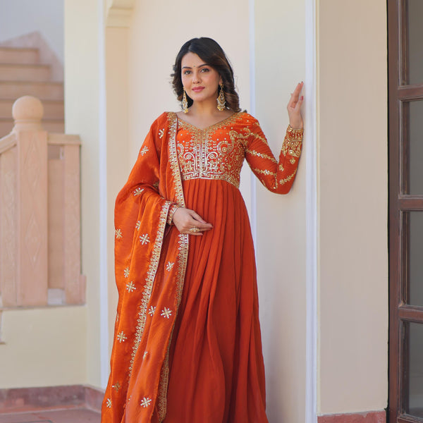 Evanik Orange Fendy Fabric With Zari & Sequins Embroidered work Gown Dupatta