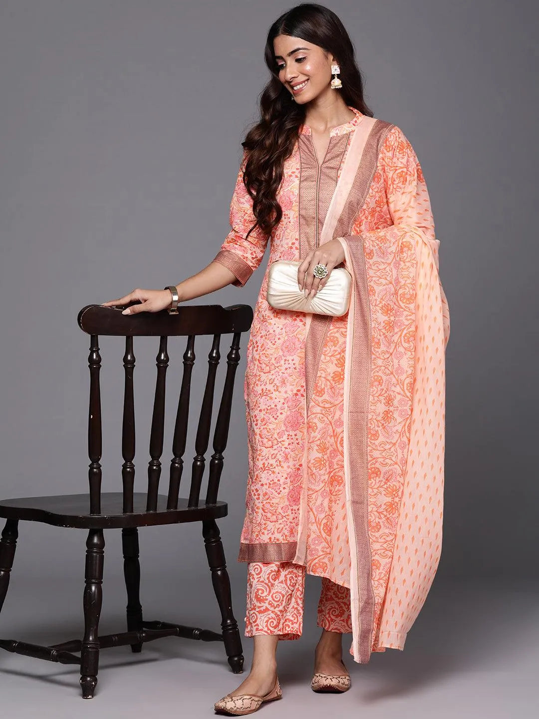 https://cdn.shopify.com/s/files/1/0341/4805/7228/products/peach-printed-cotton-straight-kurta-with-trousers-and-dupatta-libas-1.jpg?v=1739181648