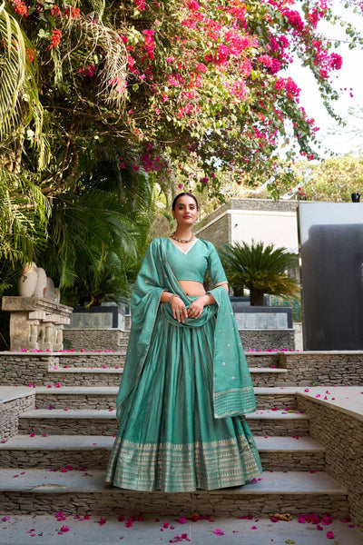 Evanik Women Pure Chanderi Plain With Zari Weaving Work Border Stitched Lehenga With Unstitched Blouse Dupatta(Up to 42)