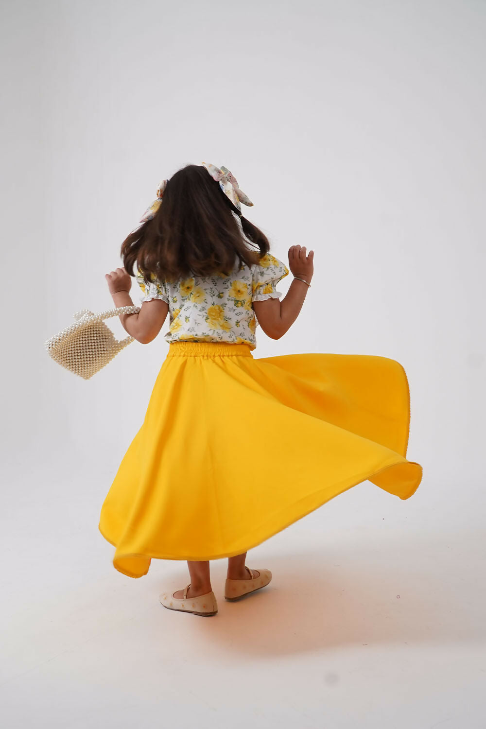 ana_puff_sleeve_top_high_low_skirt_back