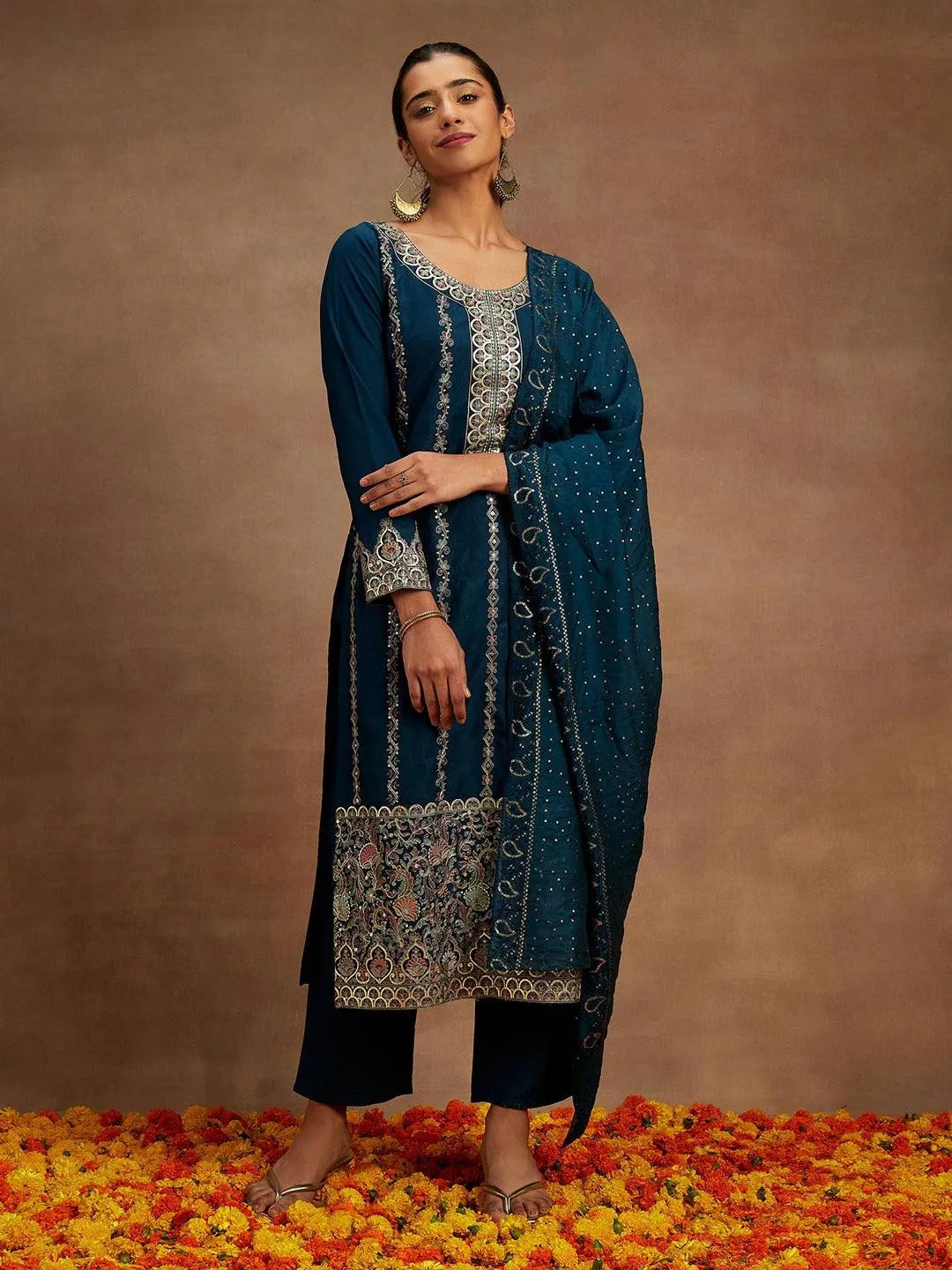 https://cdn.shopify.com/s/files/1/0341/4805/7228/products/teal-embroidered-silk-straight-kurta-with-trousers-and-dupatta-libas-2-27767401808022.jpg?v=1739541669