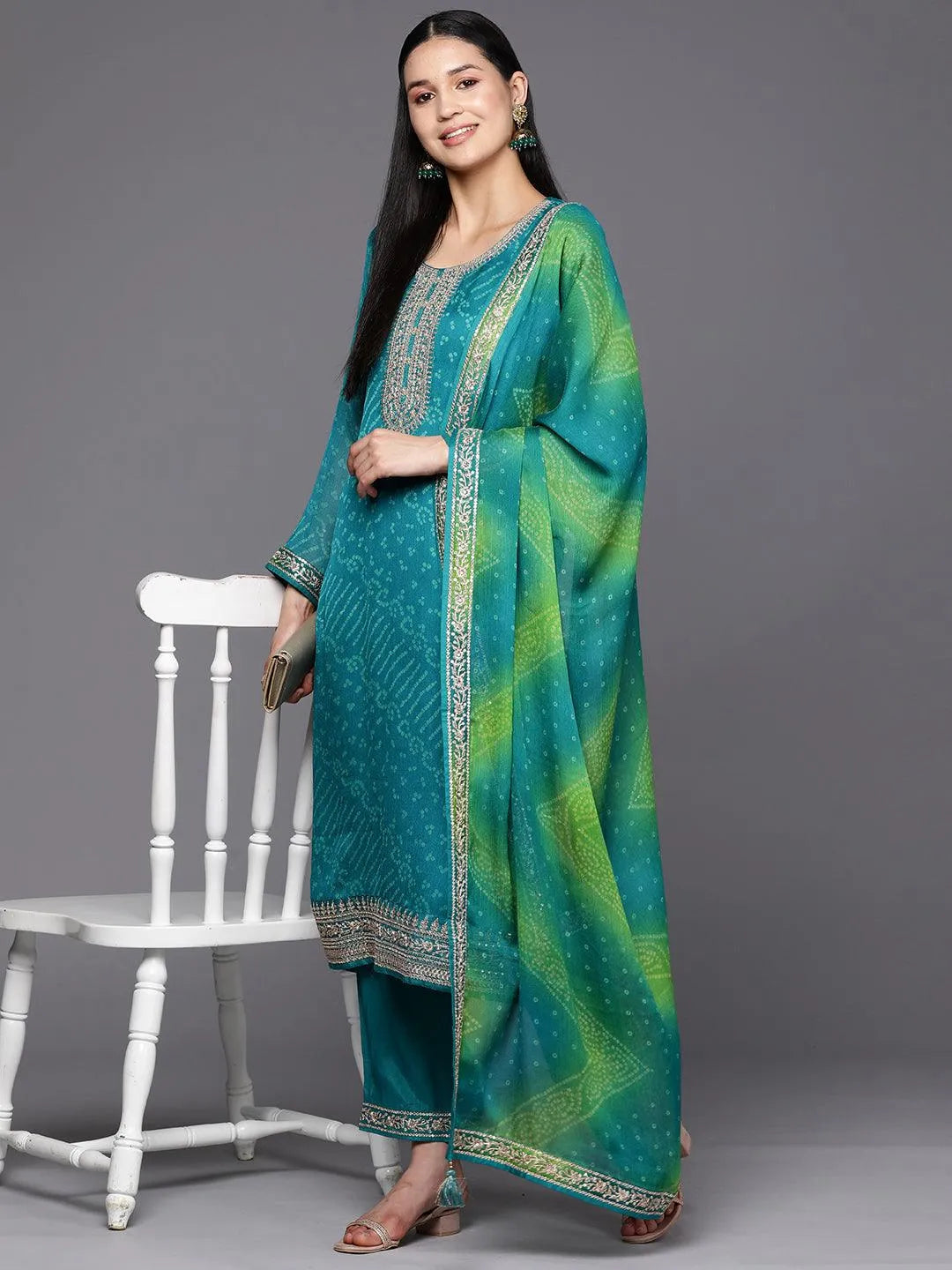 https://cdn.shopify.com/s/files/1/0341/4805/7228/files/turquoise-blue-printed-chiffon-straight-kurta-with-trousers-and-dupatta-libas-3.jpg?v=1738928749