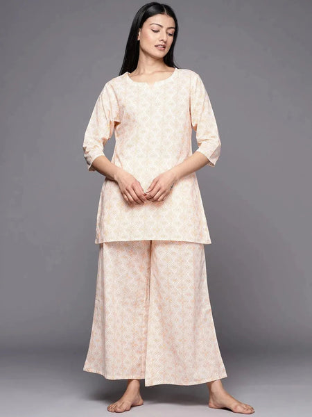 https://cdn.shopify.com/s/files/1/0341/4805/7228/files/white-printed-cotton-night-suit-libas-1-27531306467478.jpg?v=1739541788