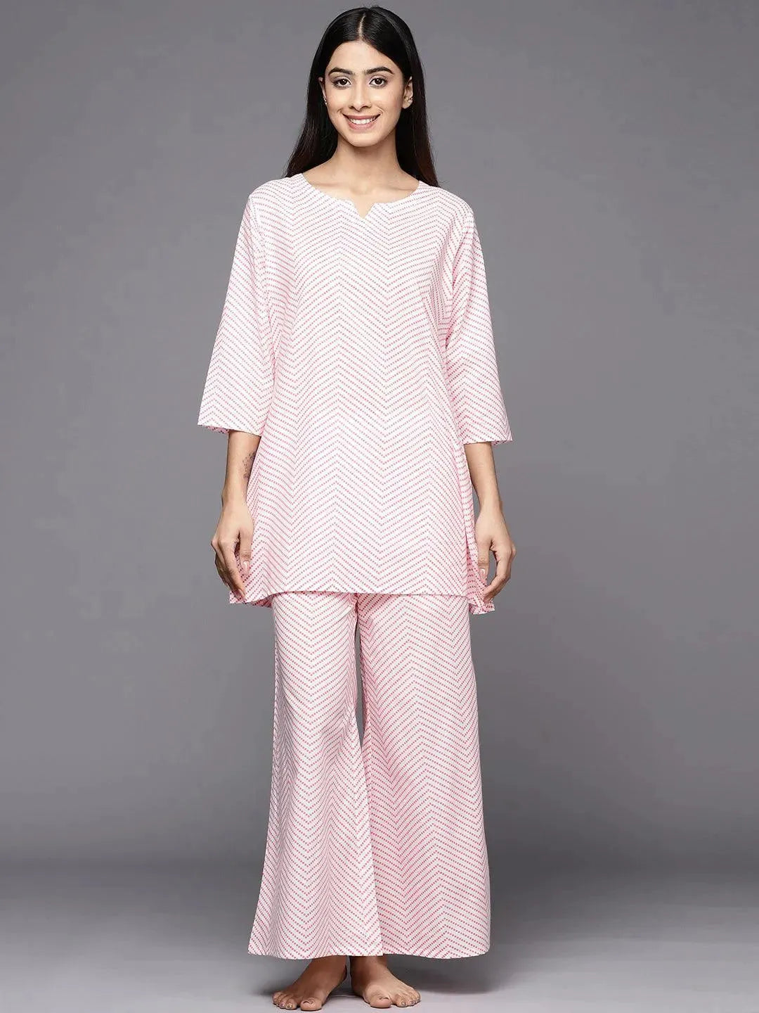 https://cdn.shopify.com/s/files/1/0341/4805/7228/files/white-printed-cotton-night-suit-libas-1-27531306631318.jpg?v=1738399537