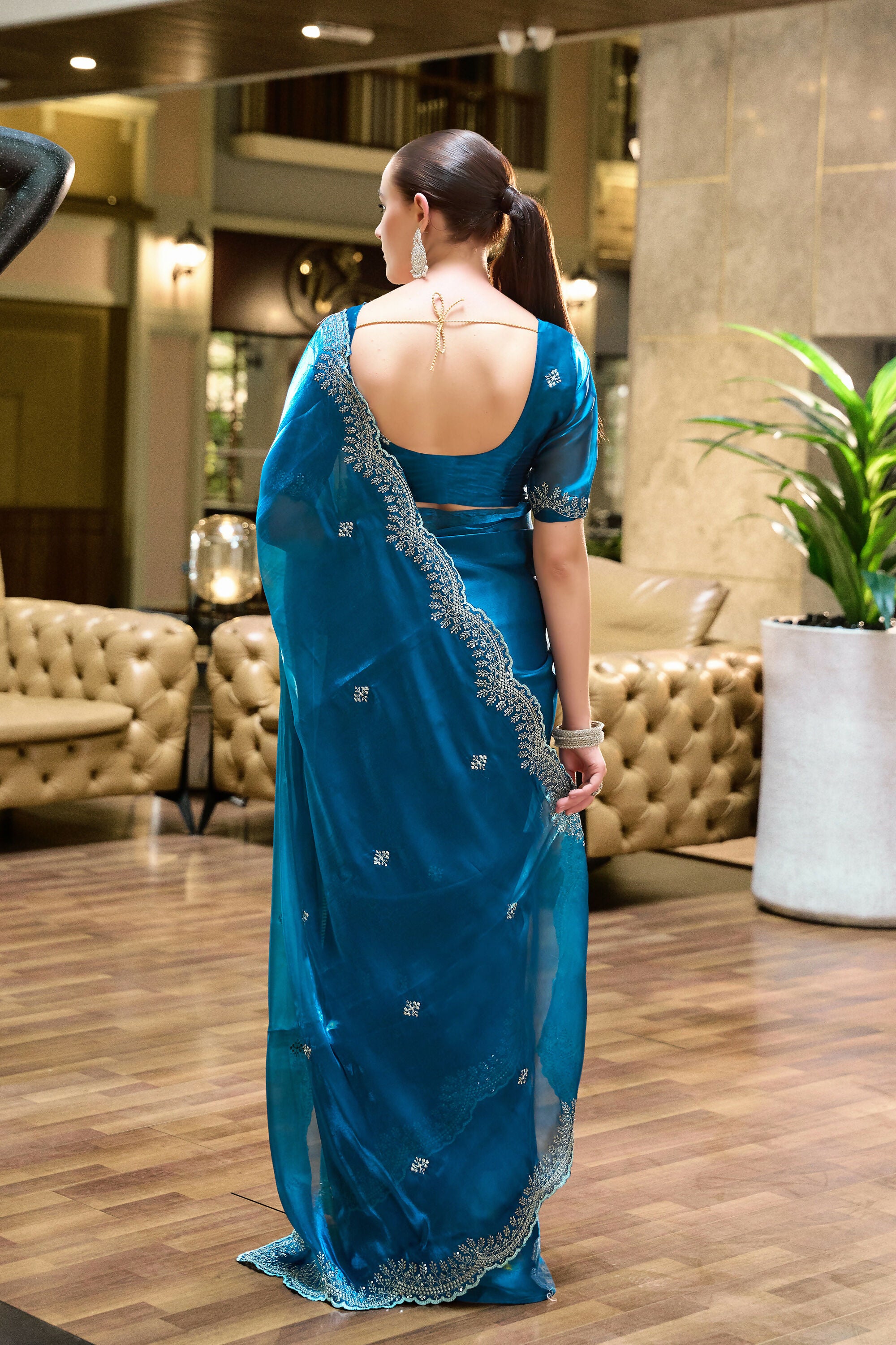 Vastranavya Sea Blue Embroidery Work Shimmer Chiffon Saree with Unstitched Blouse