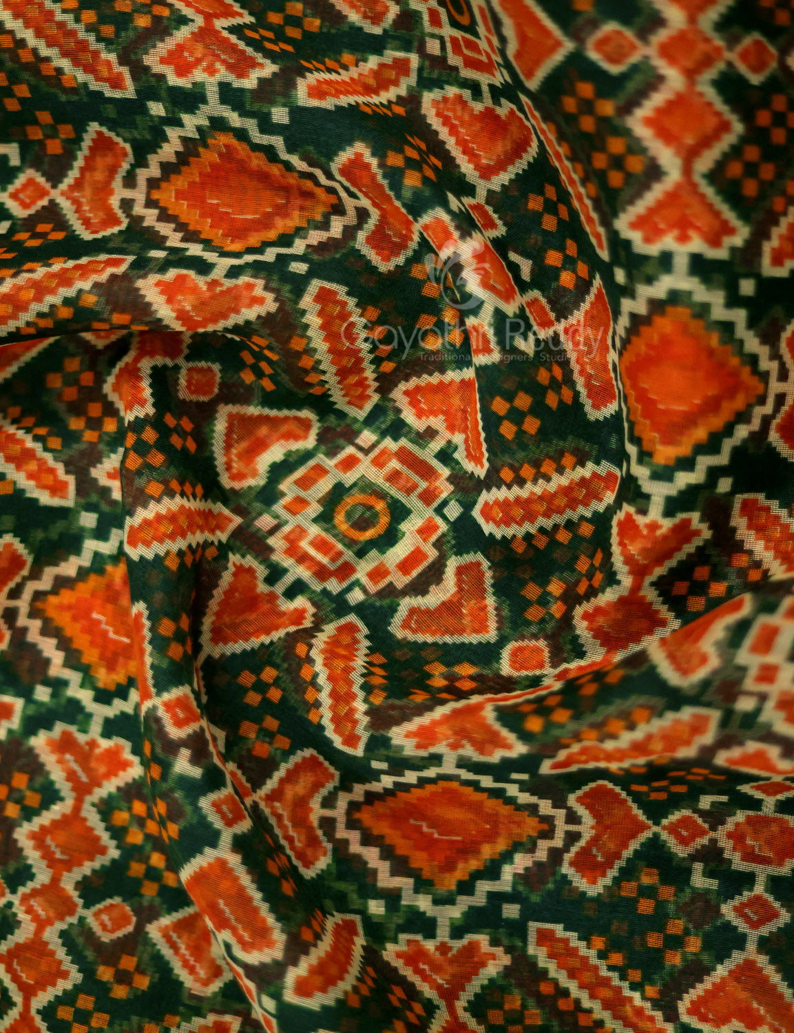 Shades of Dark Green And Orange Colour Patola Print Semi Chanderi Saree By Gayathri Reddy Designer Studio - Distacart