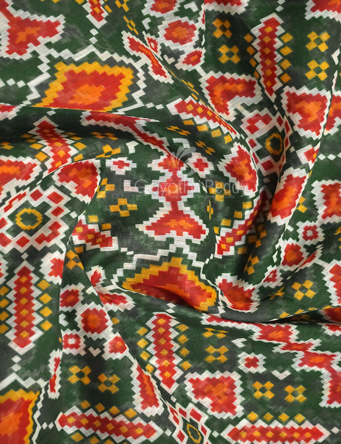 Shades of Navy Parrot Green Colour Patola Print Semi Chanderi Saree By Gayathri Reddy Designer Studio - Distacart