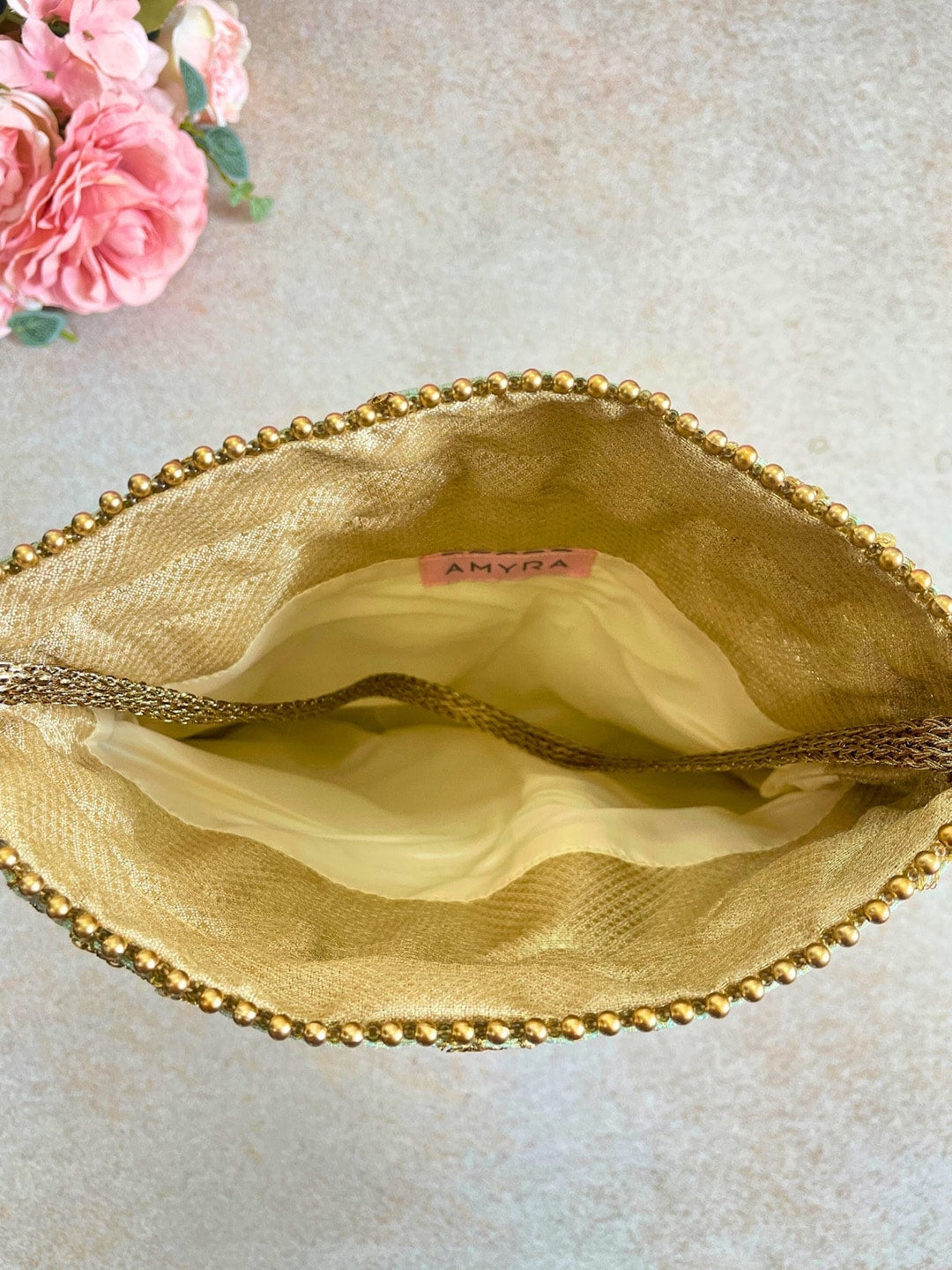 Amyra Embroidered Potli bag - Distacart