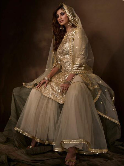 Myra Dusky Beige Soft Net Gharara Suit - Distacart
