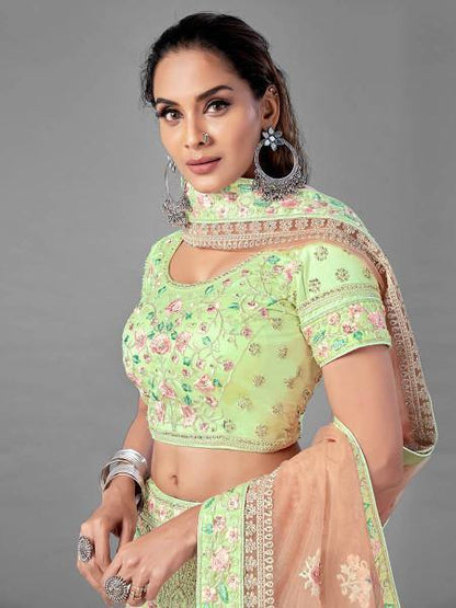 Myra Bridal Lehenga in Pista Heavy Embroidered Soft Net Online
