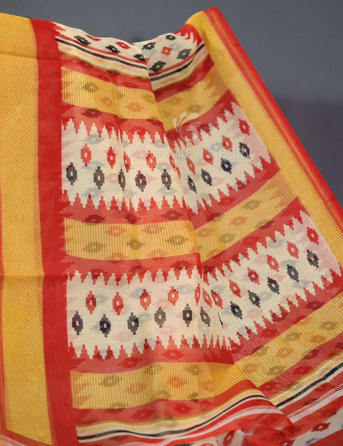 Shades of Cream And Red Colour Blouse Patola Print Semi Chanderi Saree By Gayathri Reddy Designer Studio - Distacart