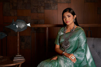 Vardha Teal Green Silver Zari Kanjeevaram Silk Saree