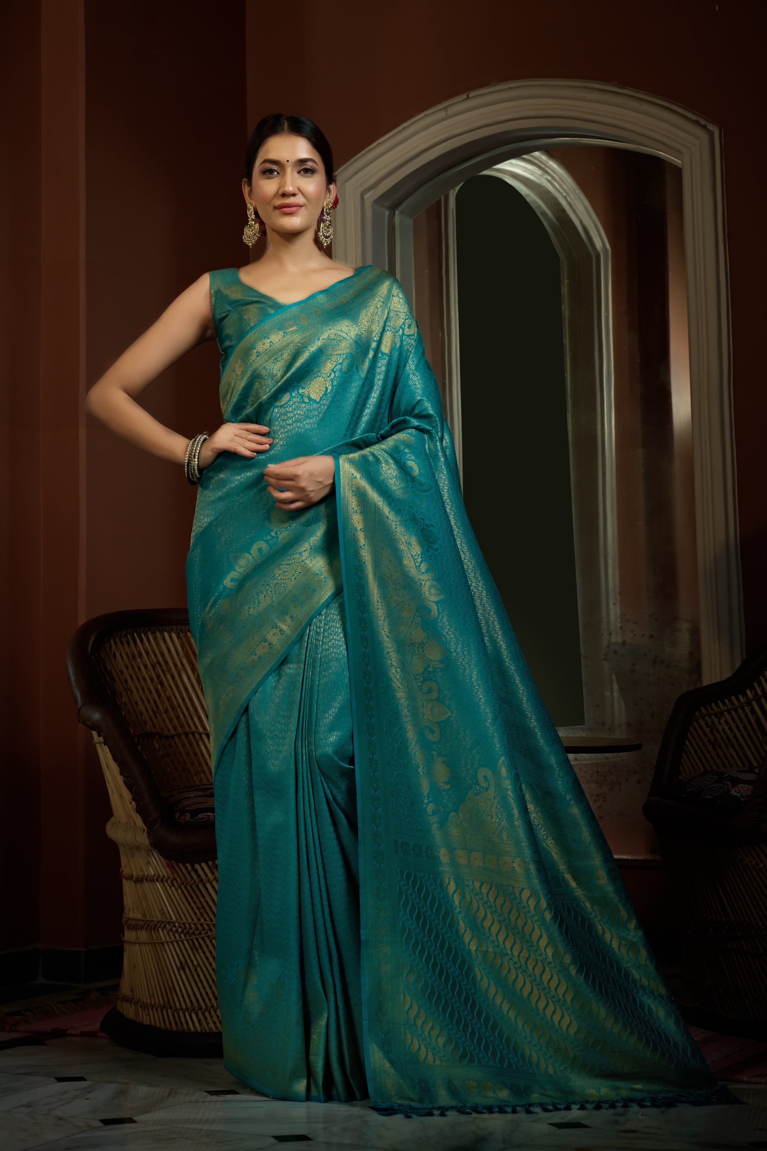 Vardha Tiffany Blue Golden Zari Kanjeevaram Silk Saree