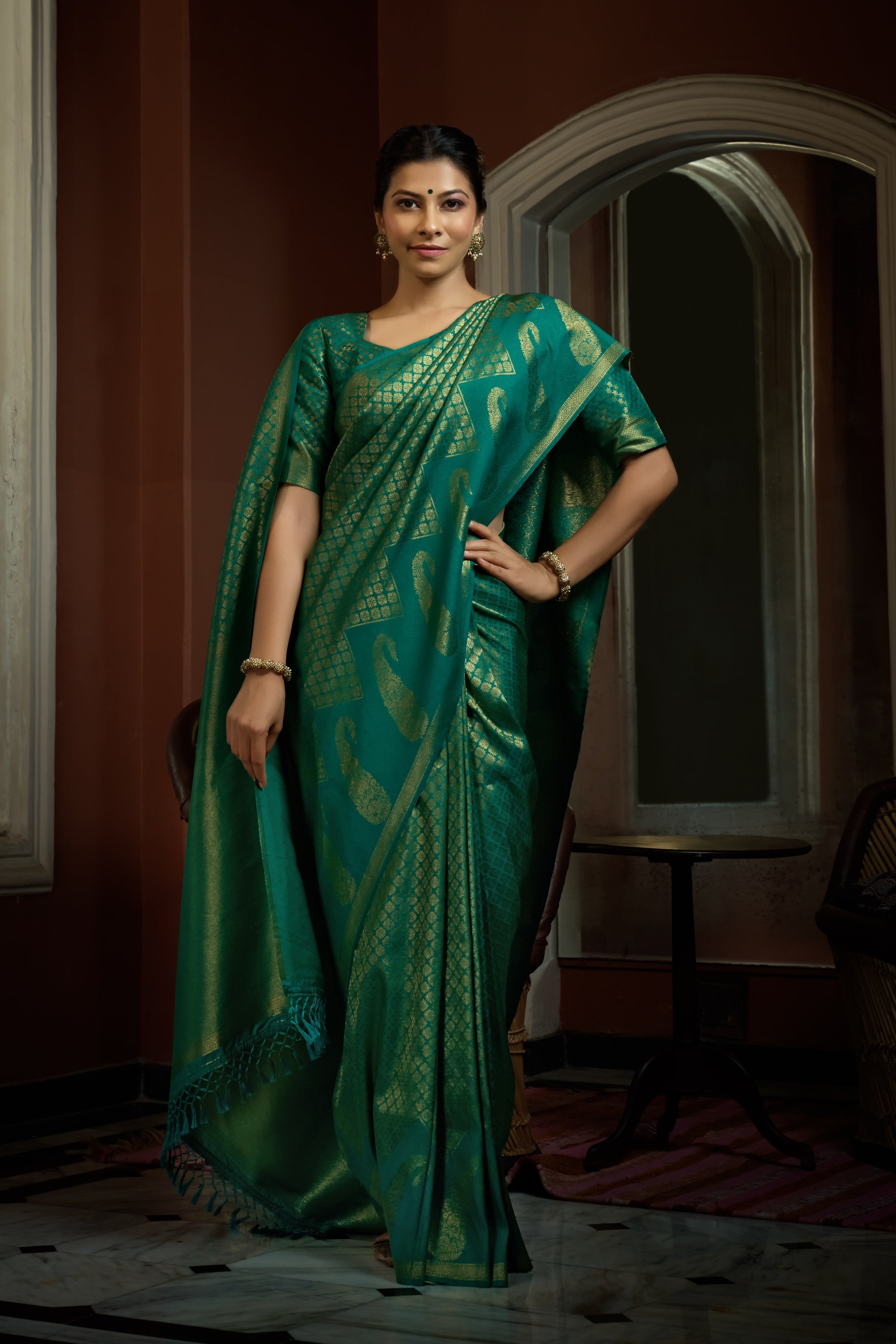 Vardha Teal Green Golden Zari Kanjeevaram Silk Saree
