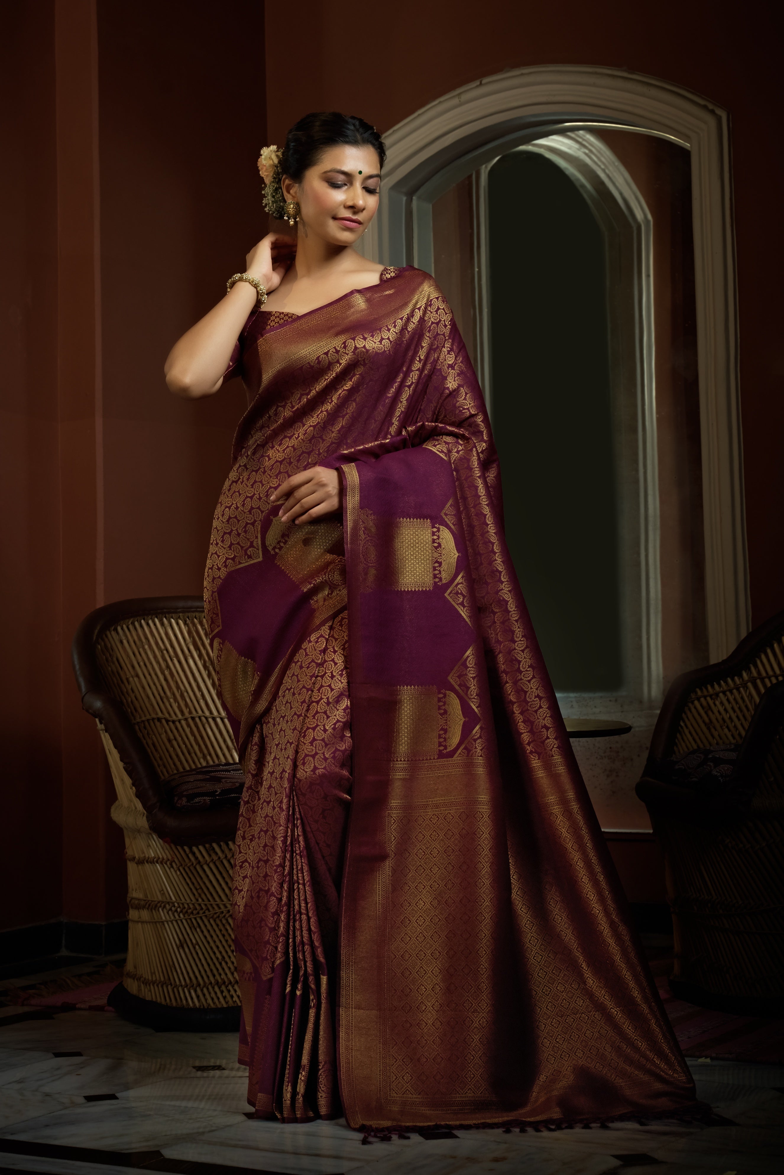 Vardha Tyrian Wine Golden Zari Kanjeevaram Silk Saree