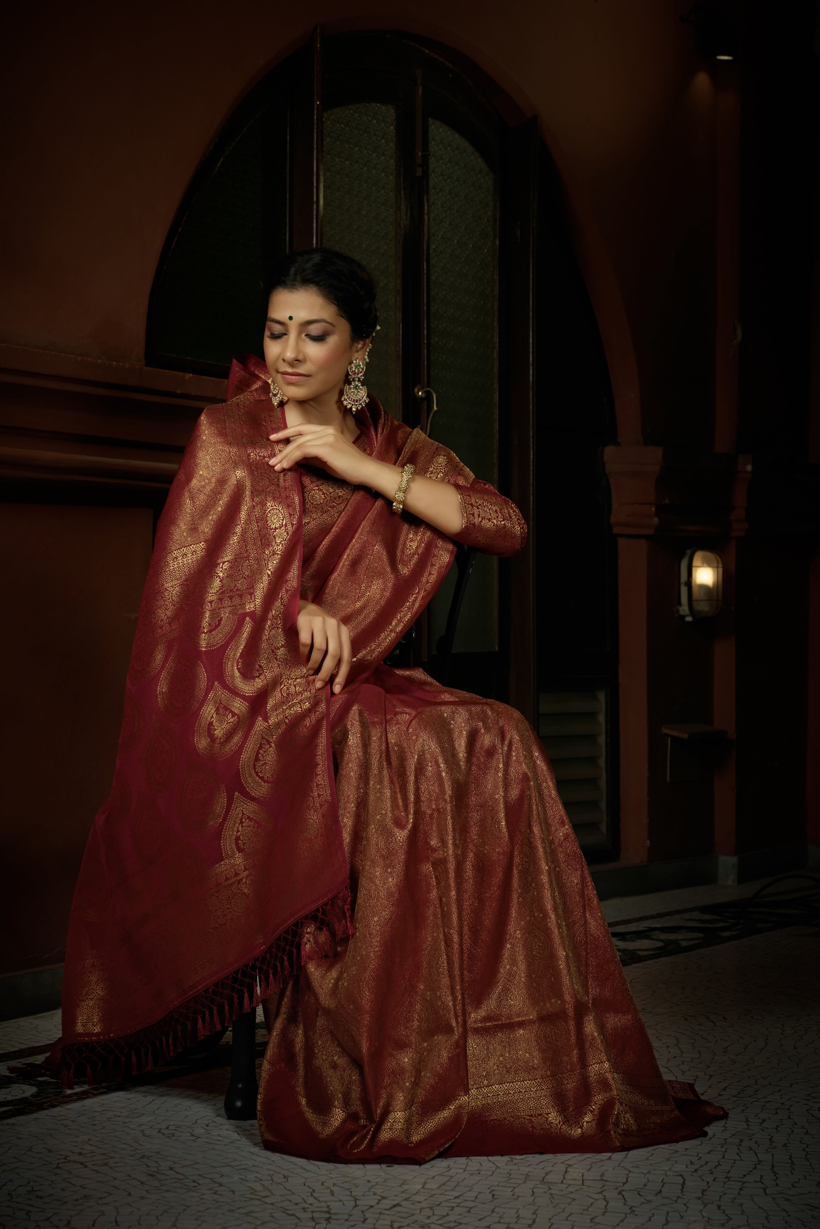 Vardha Carnelian Maroon Golden Zari Kanjeevaram Silk Saree