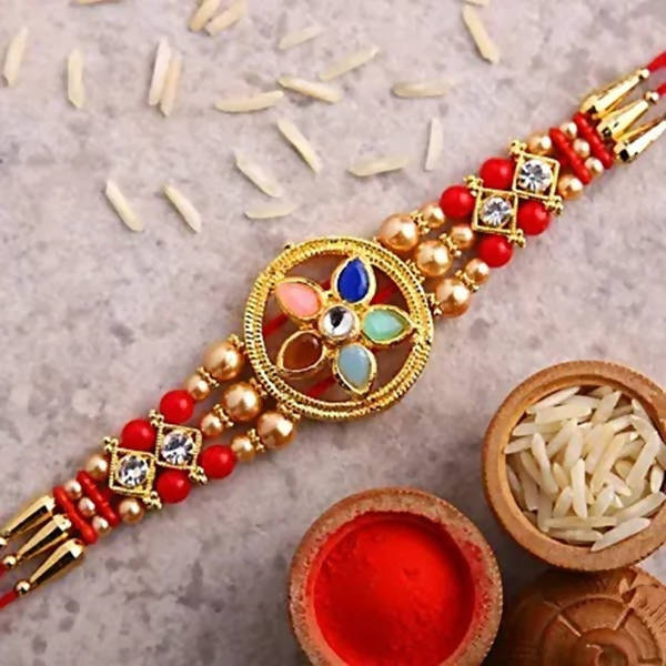 Flower Design Kundan Rakhi and Kaju Rolls Box - Distacart