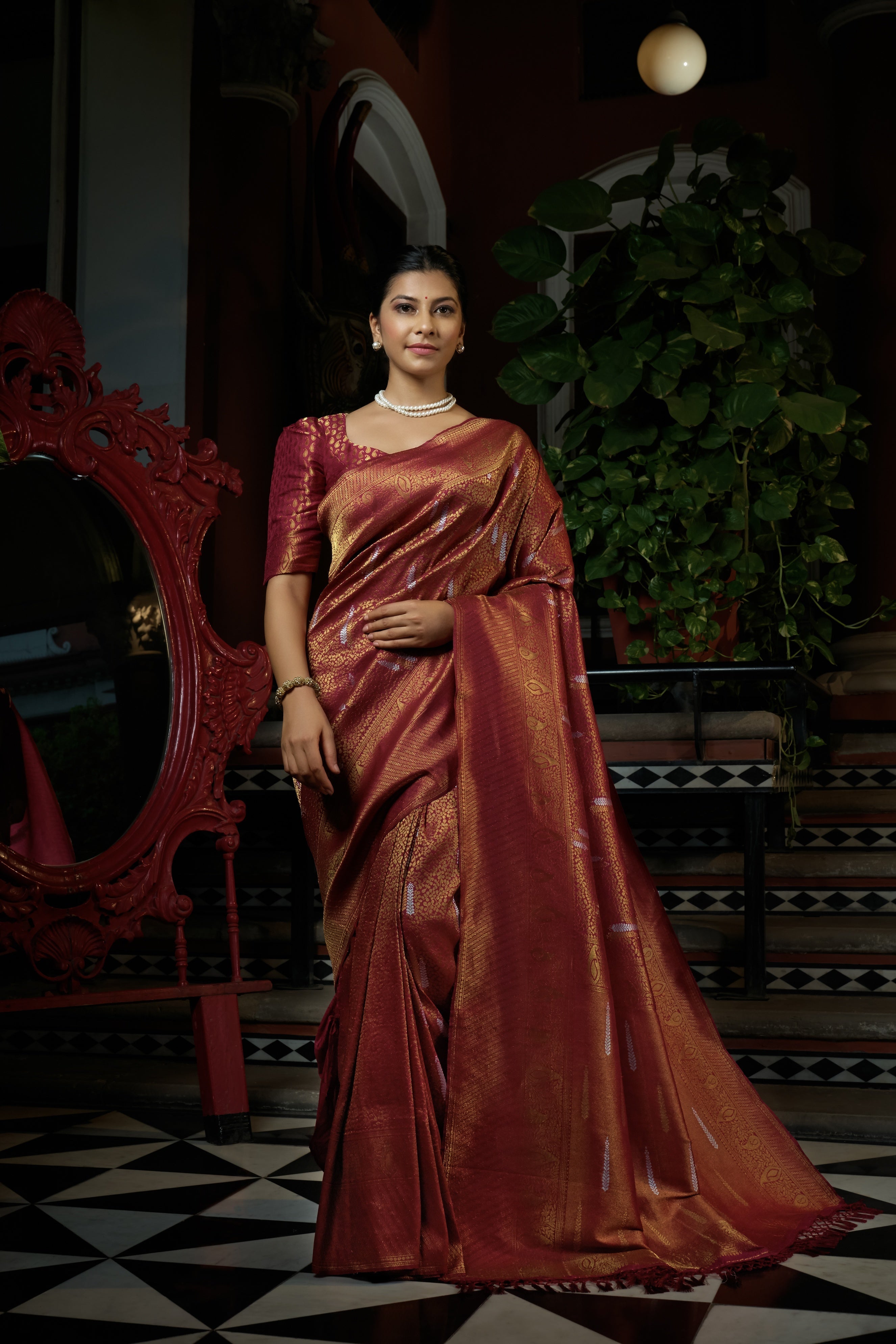 Vardha Sanguine Maroon Copper-Silver Zari Kanjeevaram Silk Saree