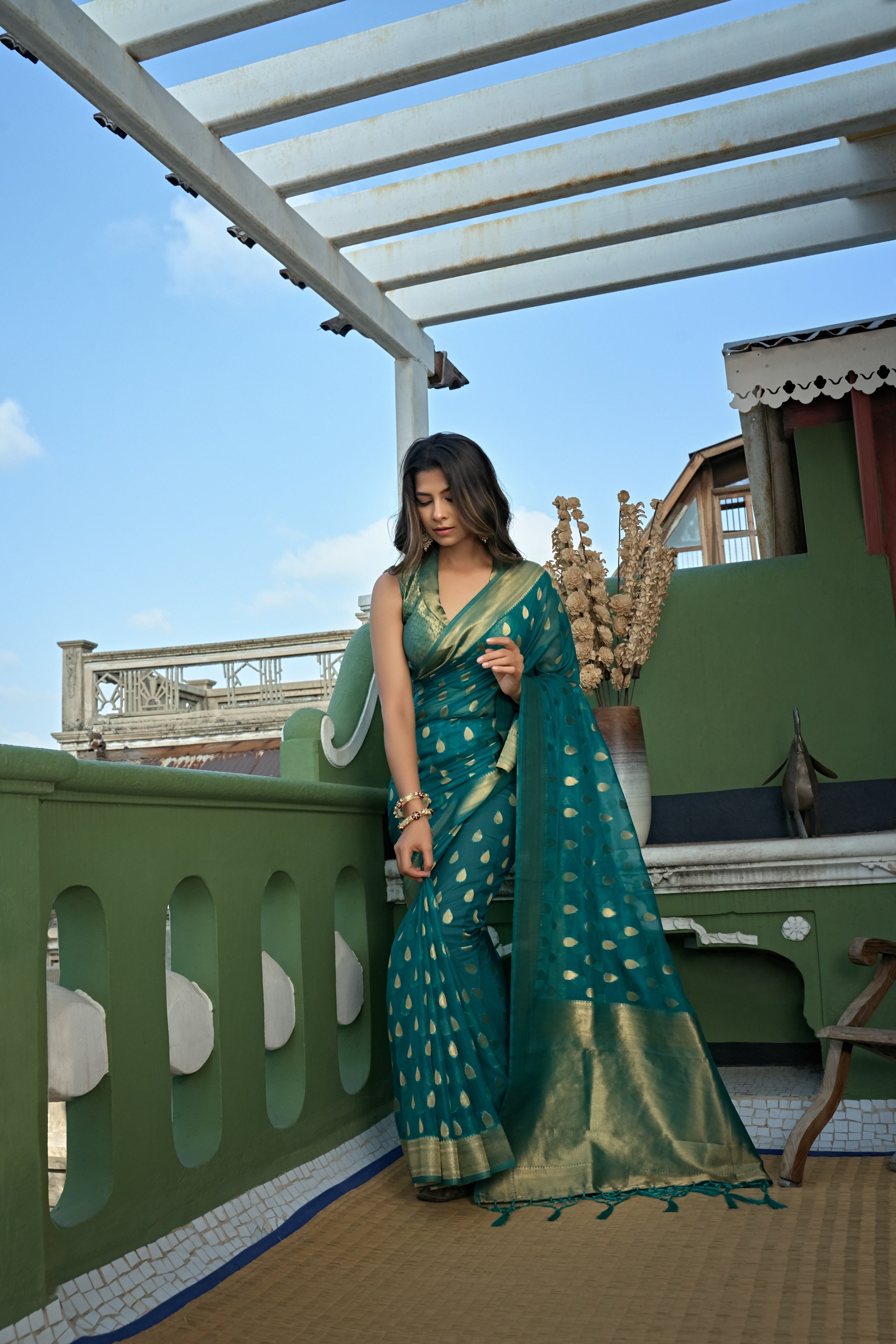 Vardha Teal Blue Golden Zari Banarasi Organza Saree
