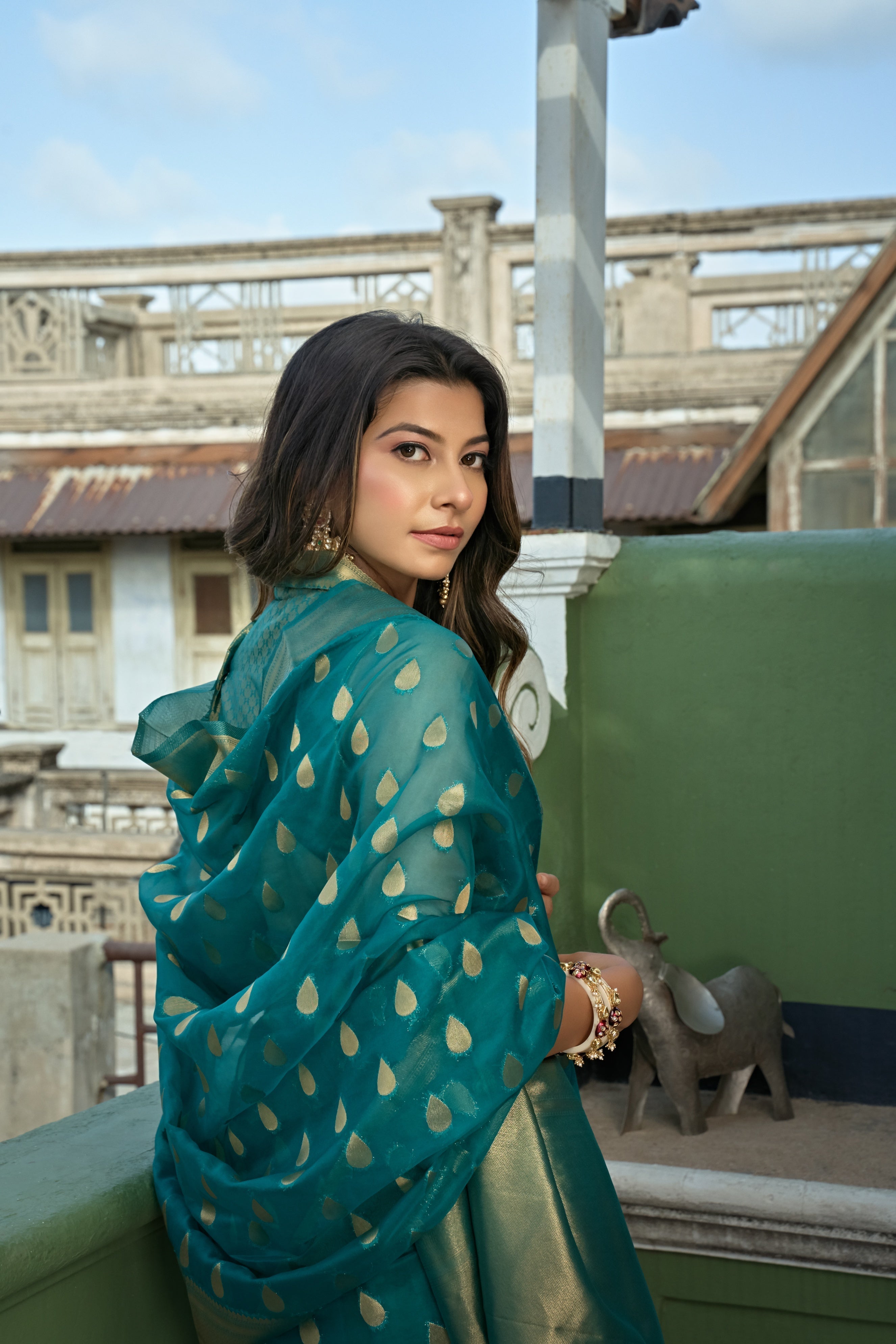 Vardha Teal Blue Golden Zari Banarasi Organza Saree