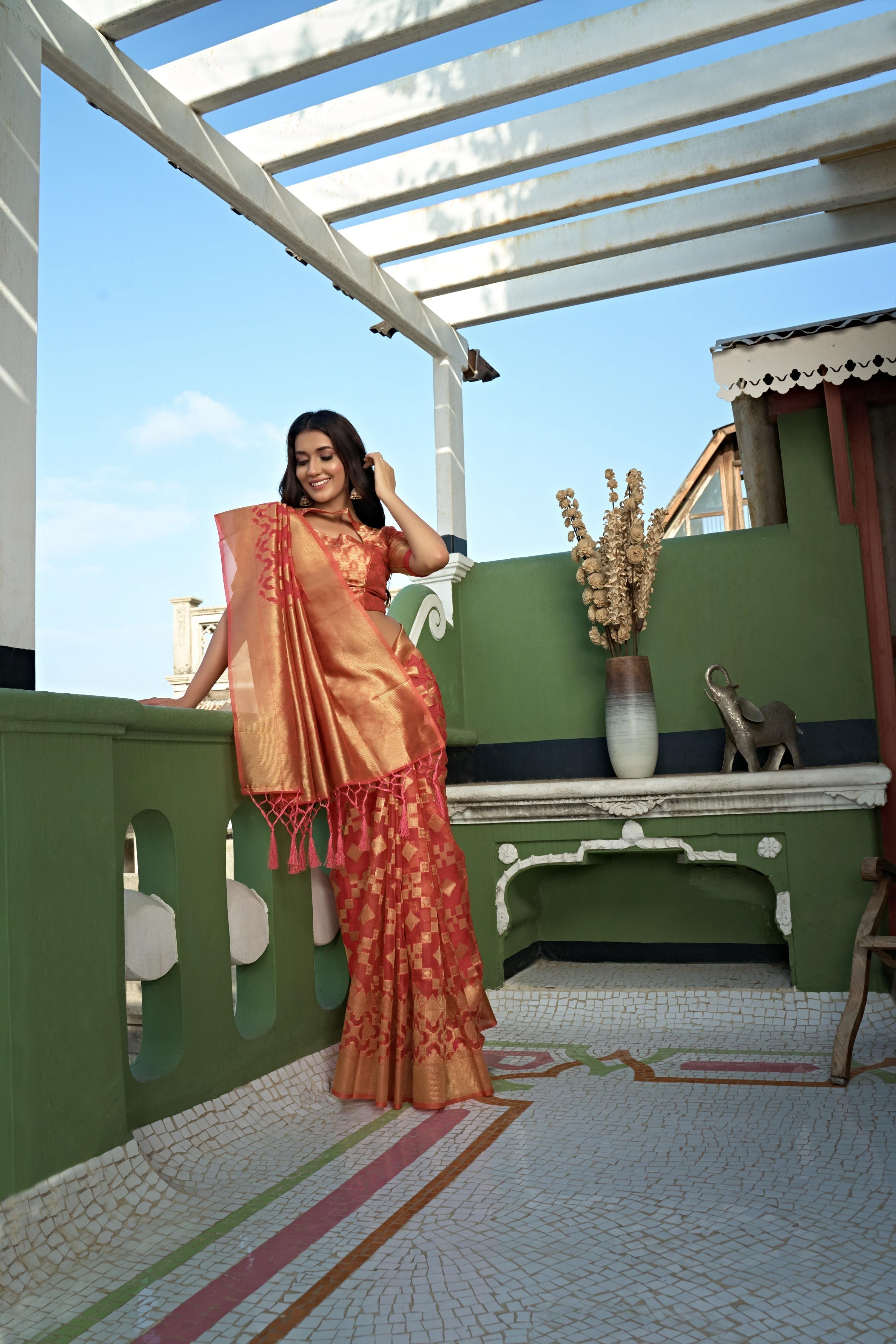 Vardha Tangerine Orange Golden Zari Banarasi Organza Saree