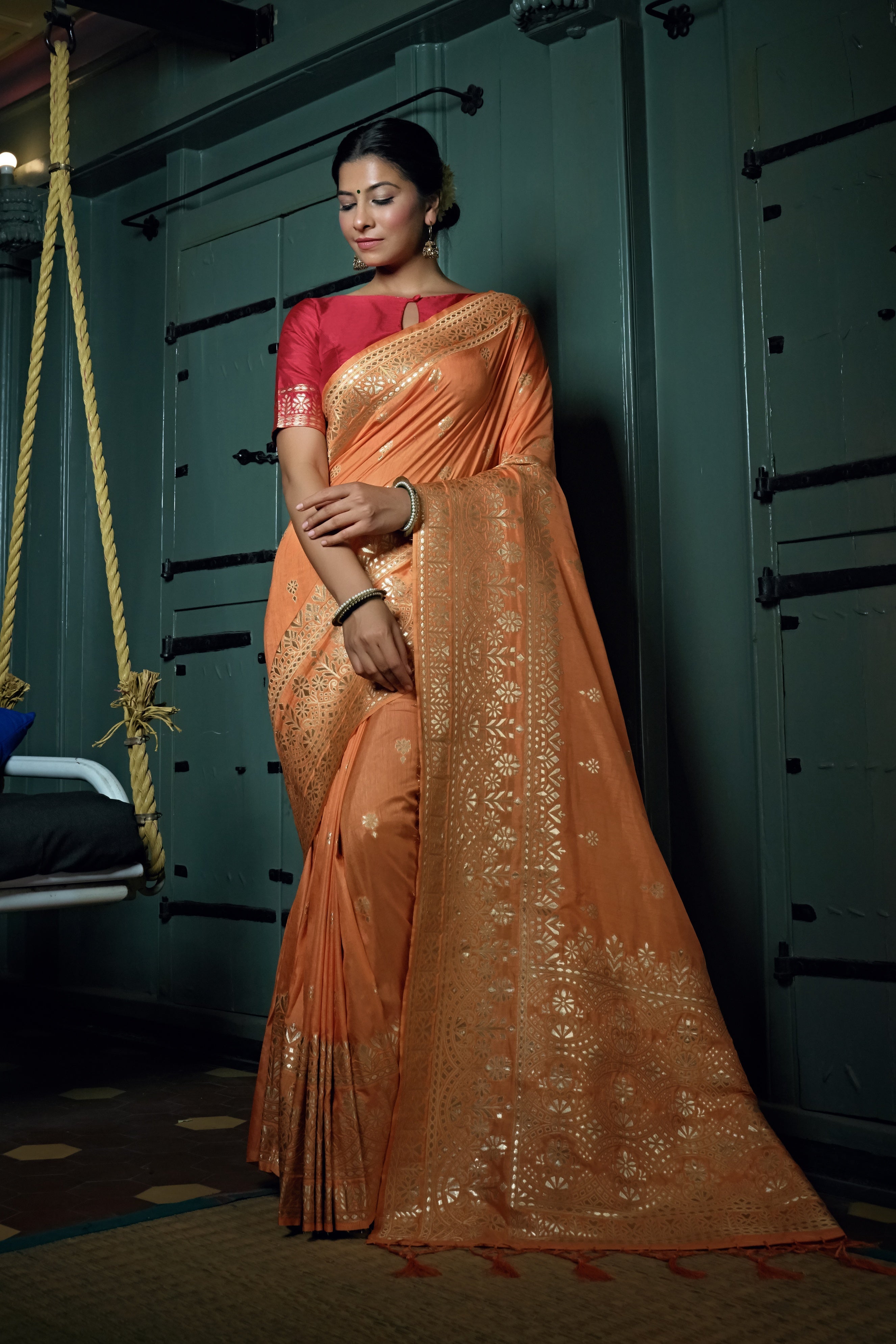 Vardha Coral Orange Golden Zari Banarasi Silk Saree