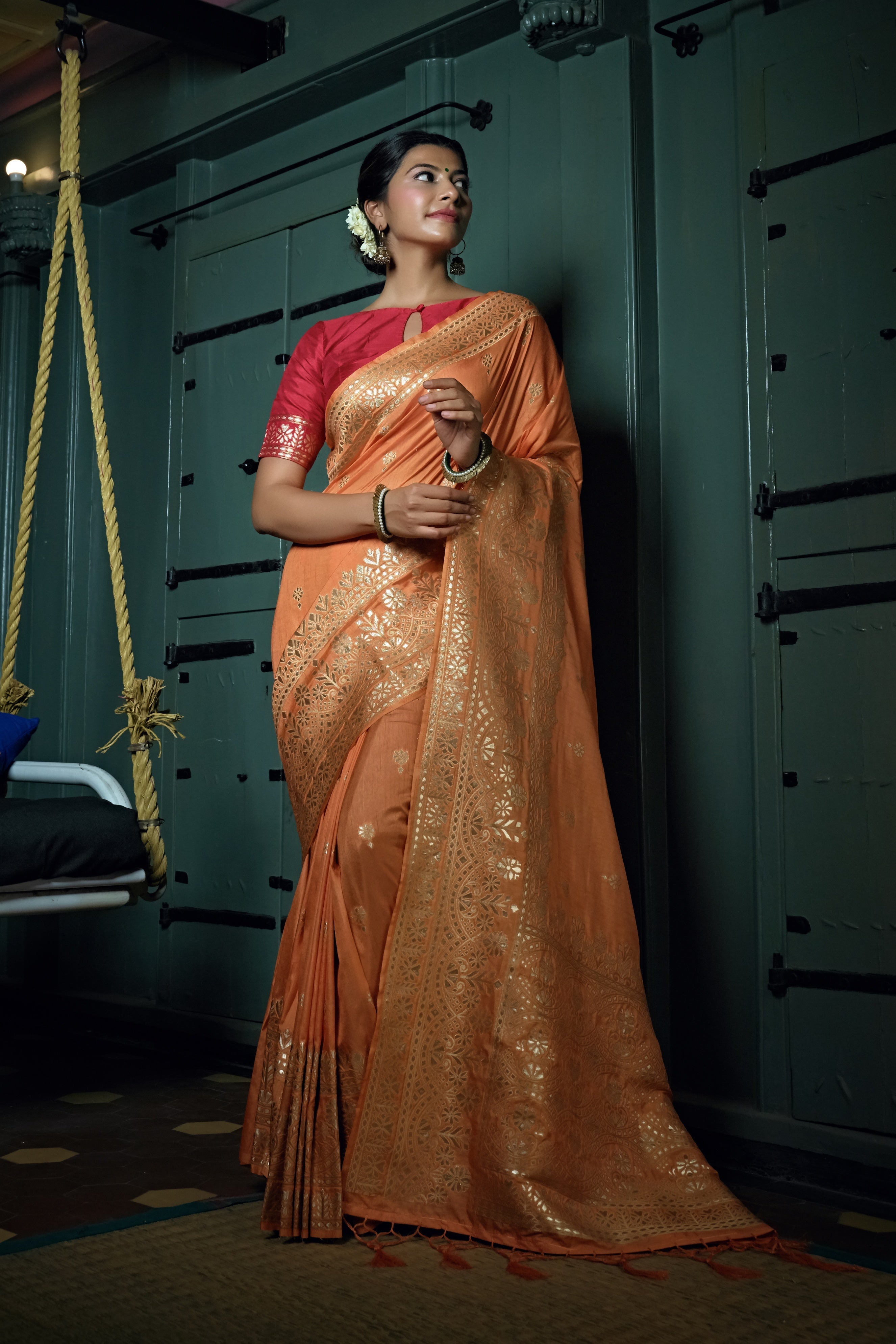Vardha Coral Orange Golden Zari Banarasi Silk Saree