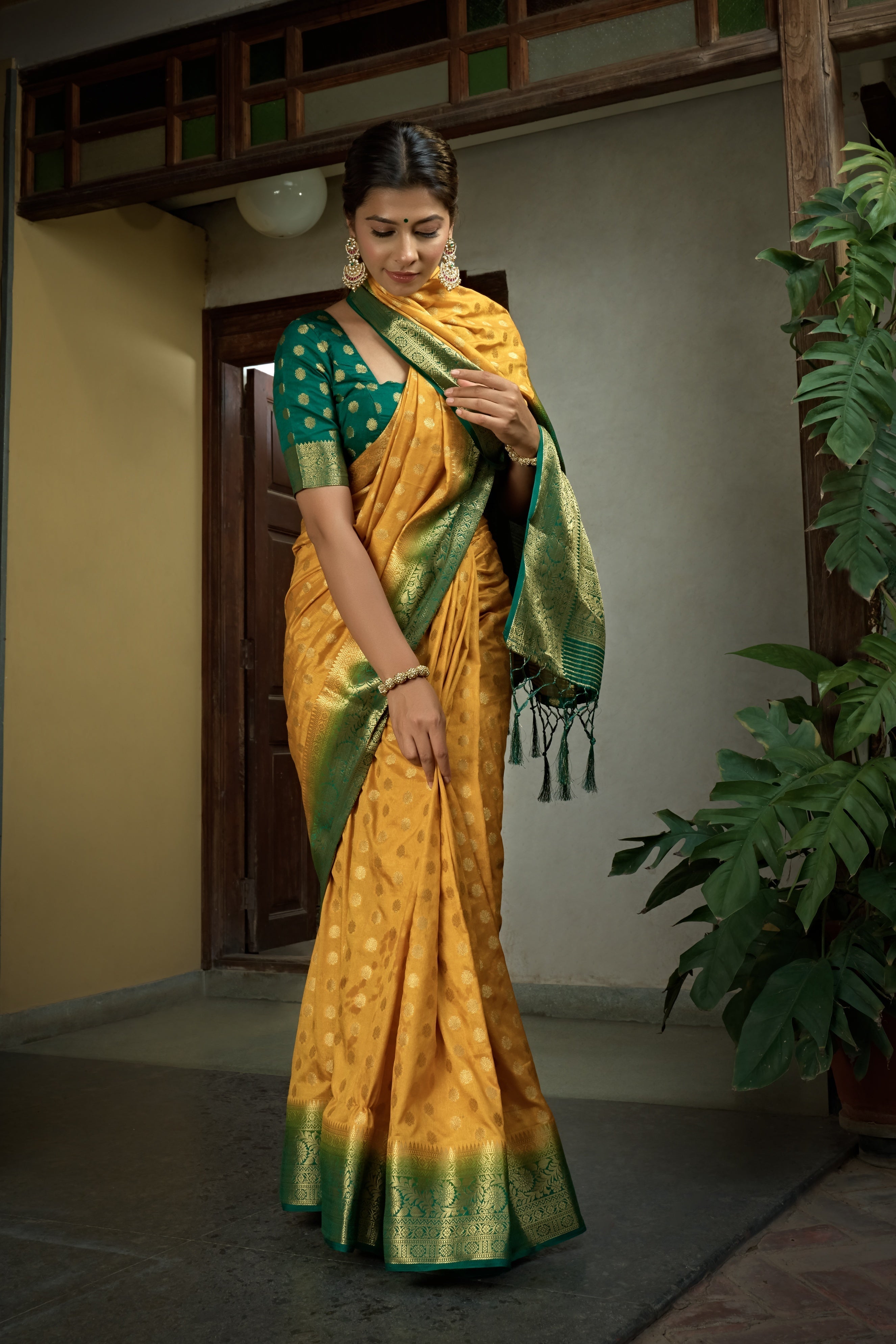 Vardha Scarlet Yellow Golden Zari Banarasi Raw Silk Saree