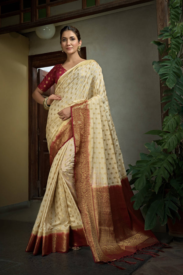 Vardha Cream White Golden Zari Banarasi Raw Silk Saree