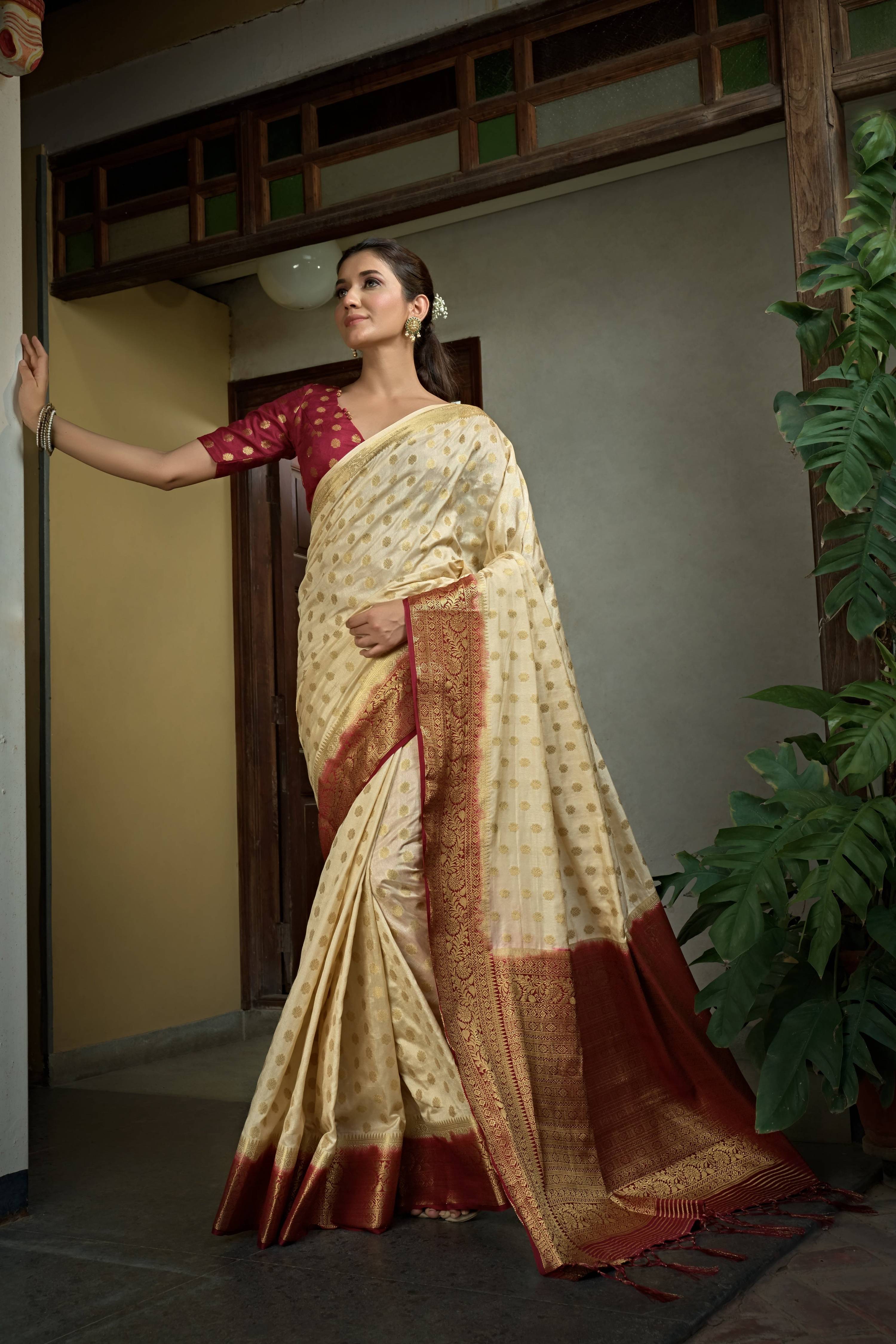 Vardha Cream White Golden Zari Banarasi Raw Silk Saree