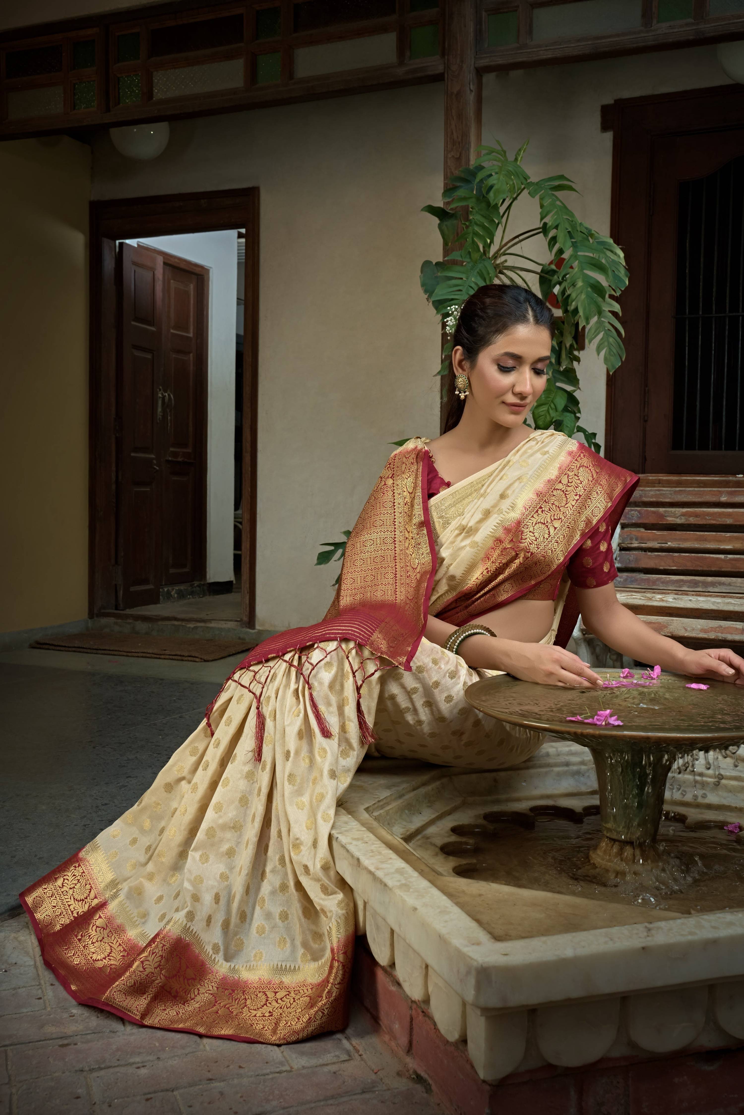 Vardha Cream White Golden Zari Banarasi Raw Silk Saree